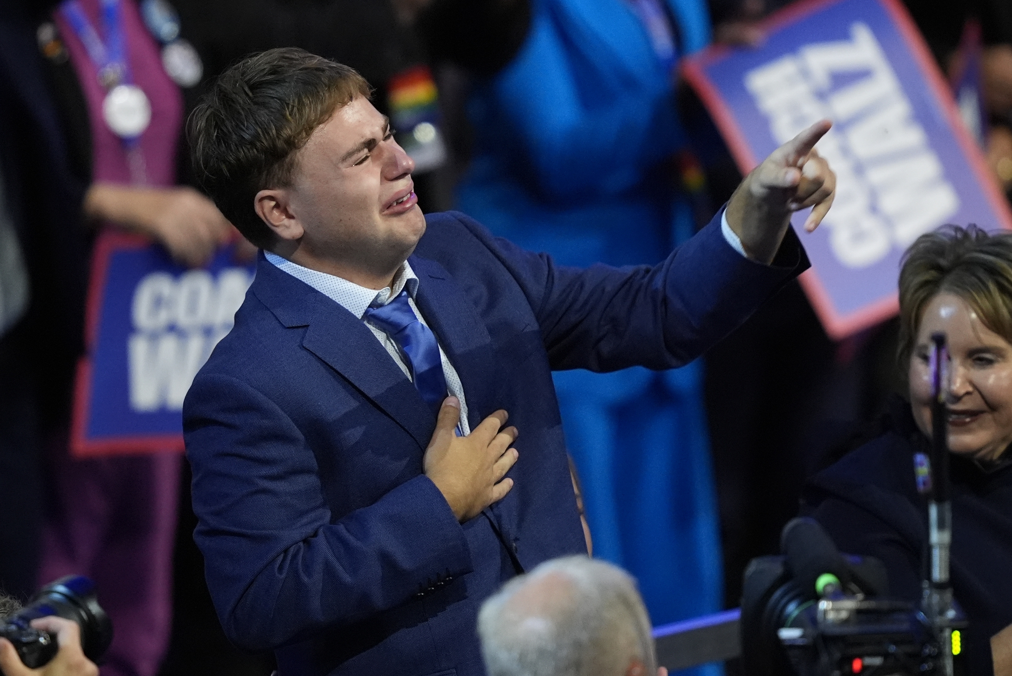 FILE - Gus Walz cries as his father Democratic vice presidential nominee Minnesota Gov. Tim Walz speaks during the Democratic National Convention Wednesday, Aug. 21, 2024, in Chicago. (AP Photo/Charles Rex Arbogast, File)