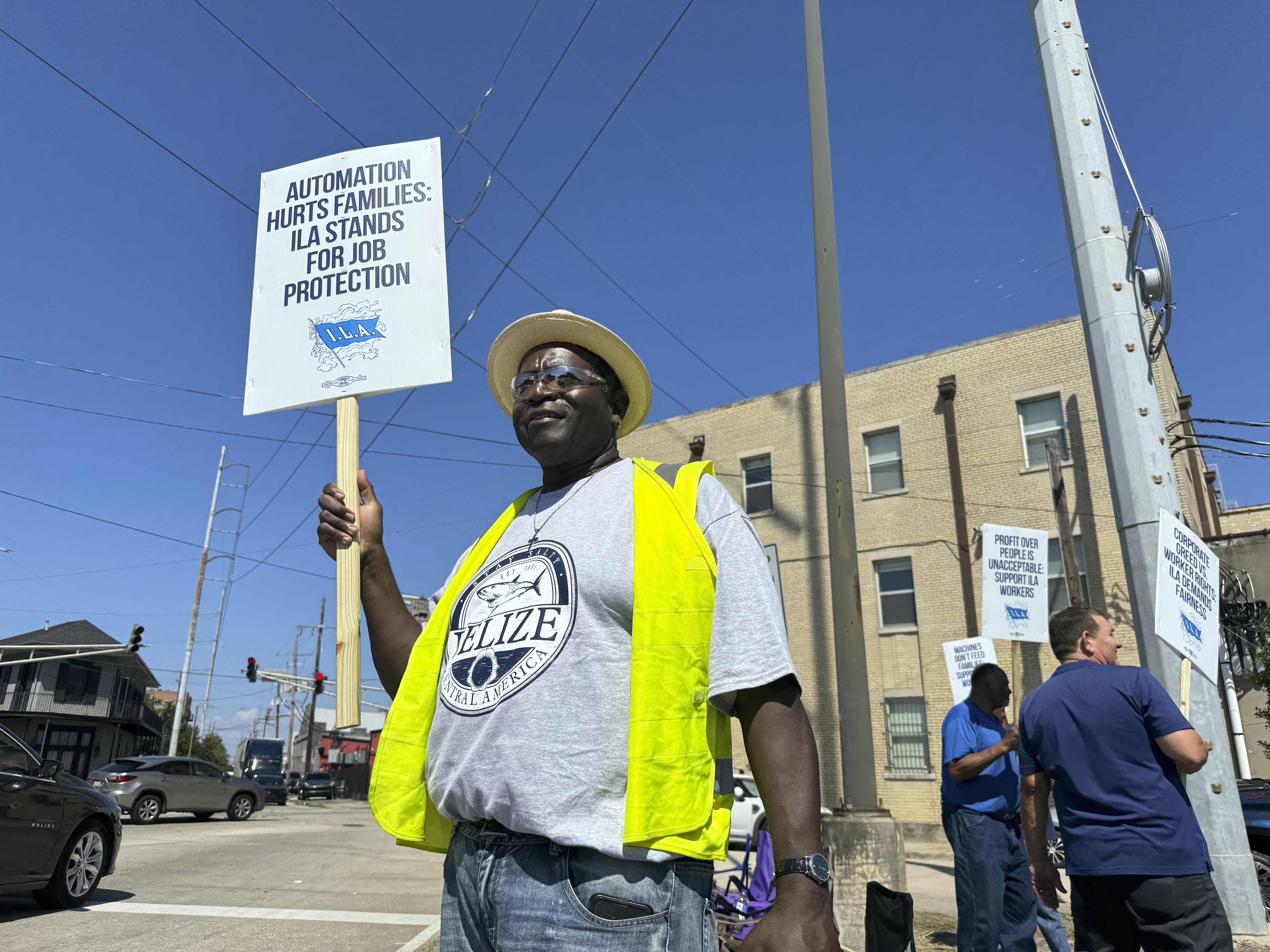 Striking International Longshoremen's Association dockworker Henderson Wilson, 61, stands on the picket line near the Port of New Orleans in Louisiana, Tuesday, Oct. 1, 2024. (AP Photo/Jack Brook)