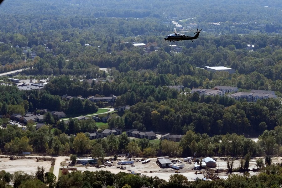 Marine One, with President Joe Biden on board, flies around areas impacted by Hurricane Helene over Asheville, N.C., Wednesday, Oct. 2, 2024. (AP Photo/Susan Walsh) (AP Photo/Susan Walsh)