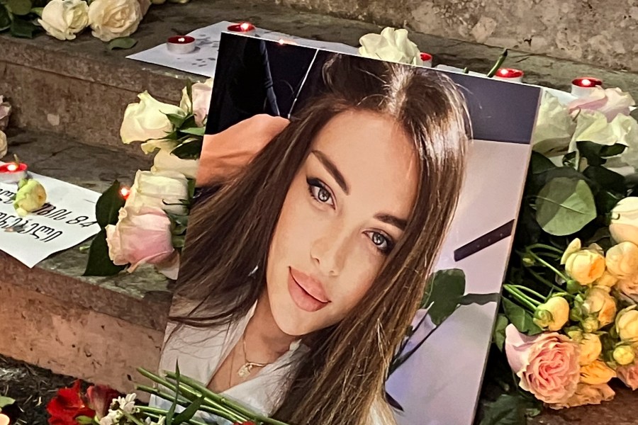 A portrait of Kesaria Abramidze, a transgender actor and model who was stabbed to death, is displayed at a vigil near parliament in Tbilisi, Georgia, Thursday, Sept. 19, 2024. (AP Photo/Sophiko Megrelidze)