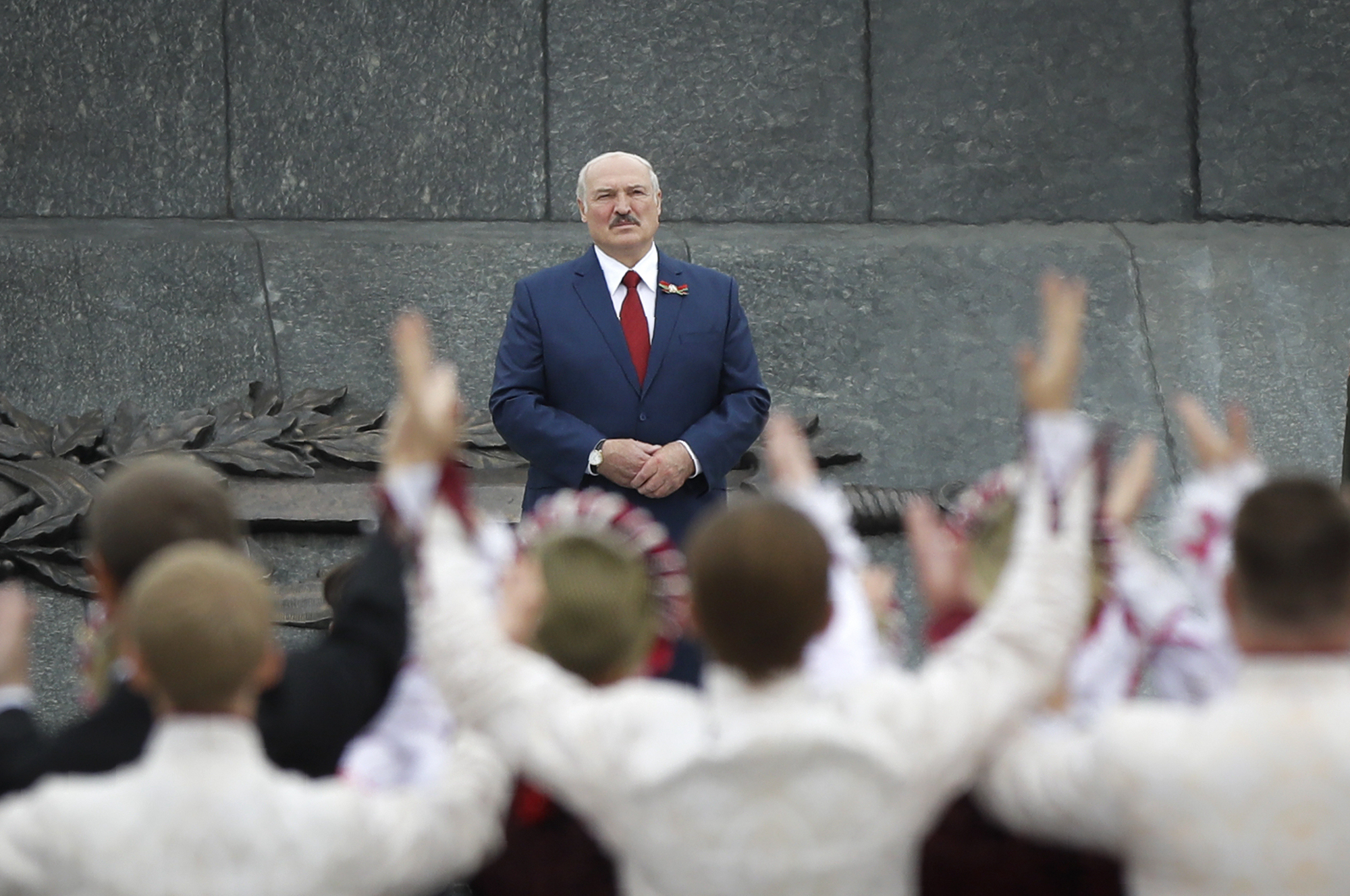 FILE - Belarus President Alexander Lukashenko speaks to schoolchildren at Independence Day celebrations in Minsk, Belarus, on July 3, 2020. (AP Photo, File)