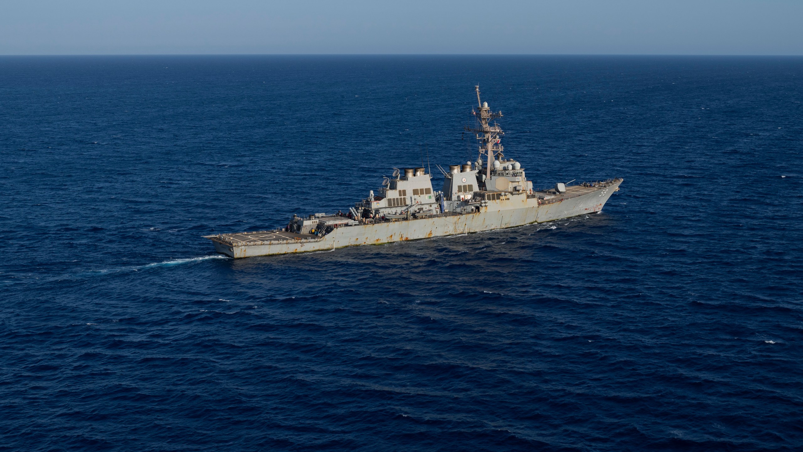 FILE - The Arleigh Burke-class guided missile destroyer USS Laboon sails in the Red Sea, June 12, 2024. (AP Photo/Bernat Armangue, File)