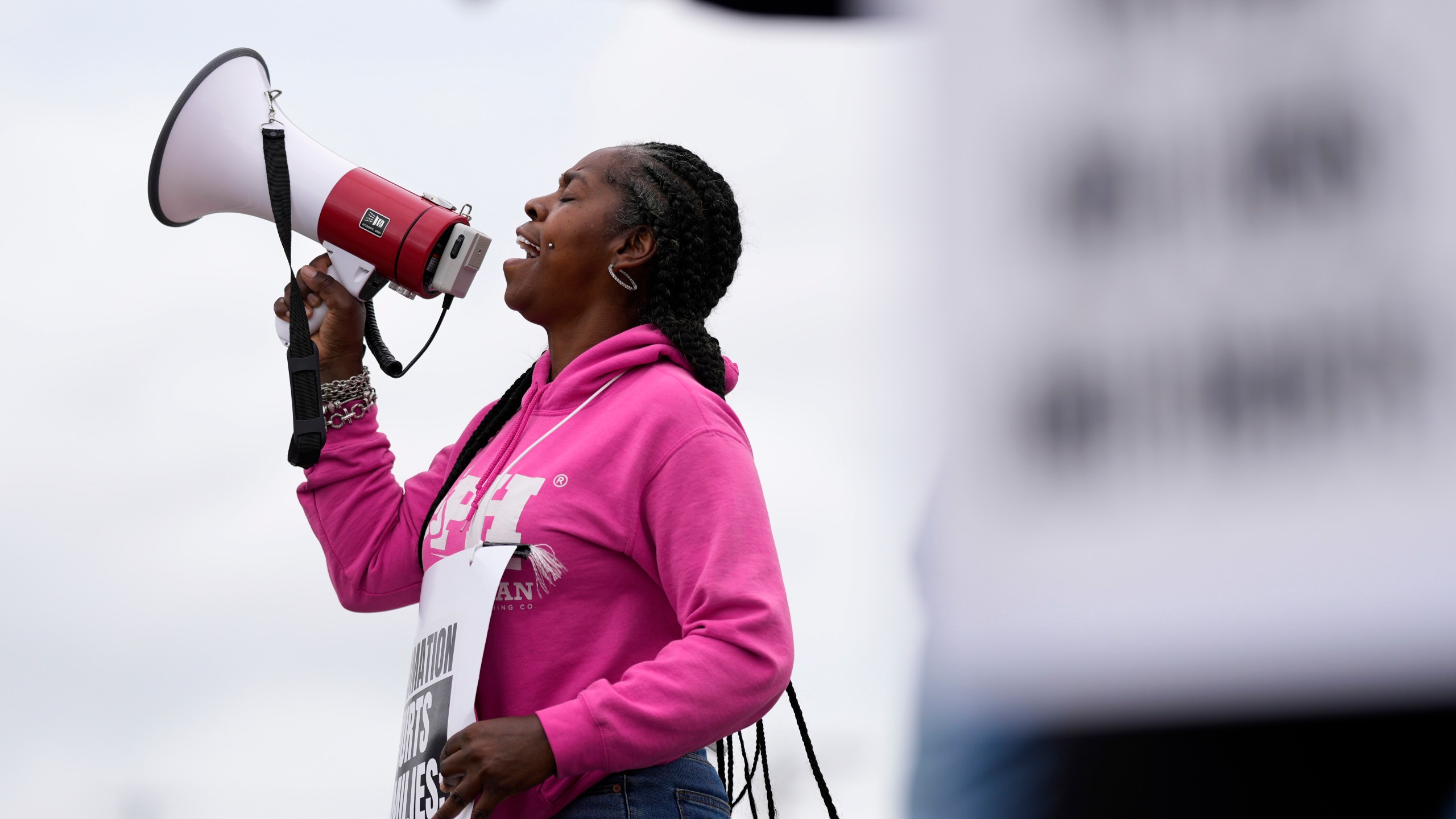 Striking longshoreman Teresa Whitte, of New York, pickets outside the Packer Avenue Marine Terminal Port, Tuesday, Oct. 1, 2024, in Philadelphia. (AP Photo/Matt Slocum)