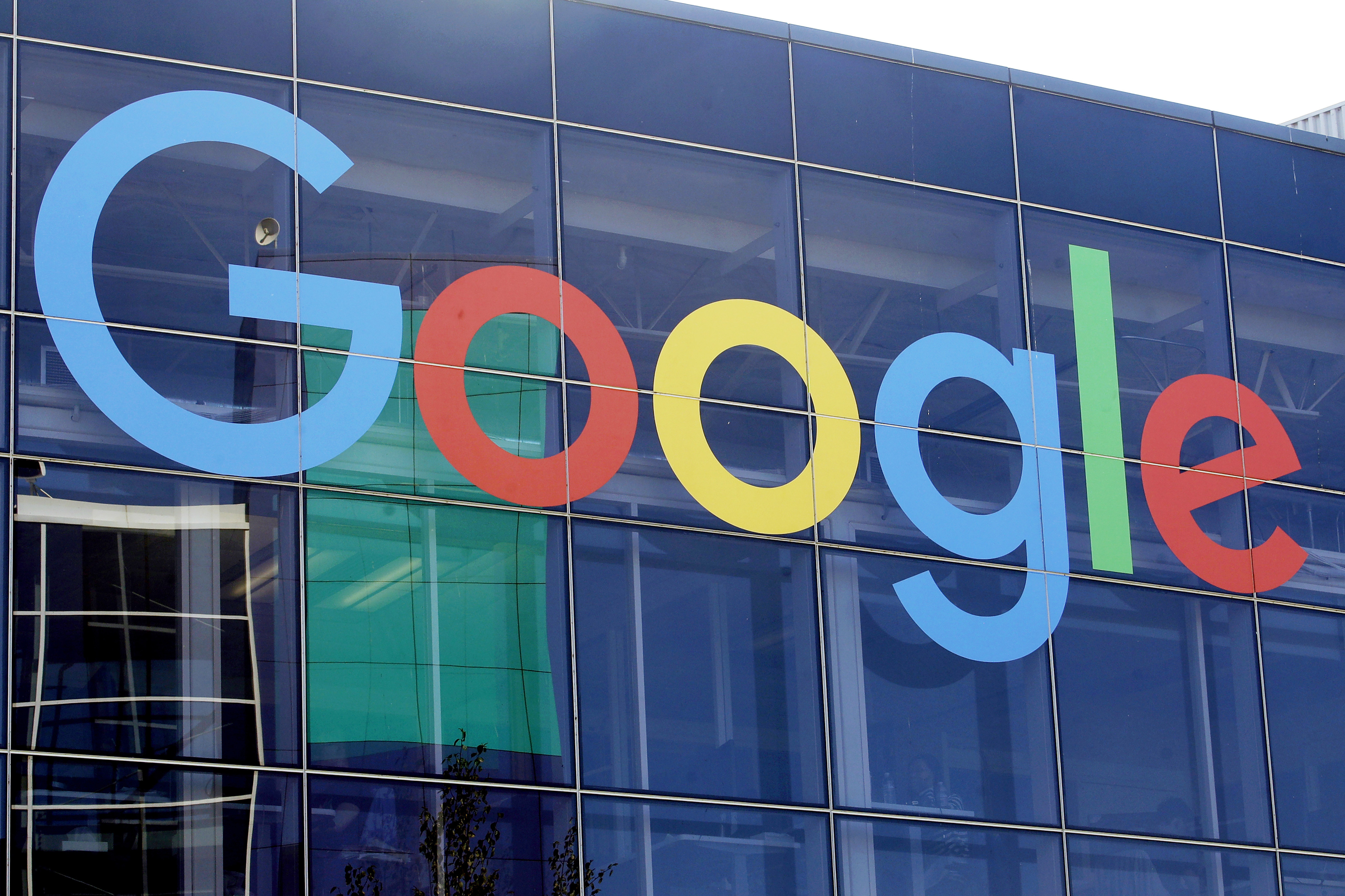 FILE - A sign is shown on a Google building at their campus in Mountain View, Calif., on Sept. 24, 2019. (AP Photo/Jeff Chiu, File)