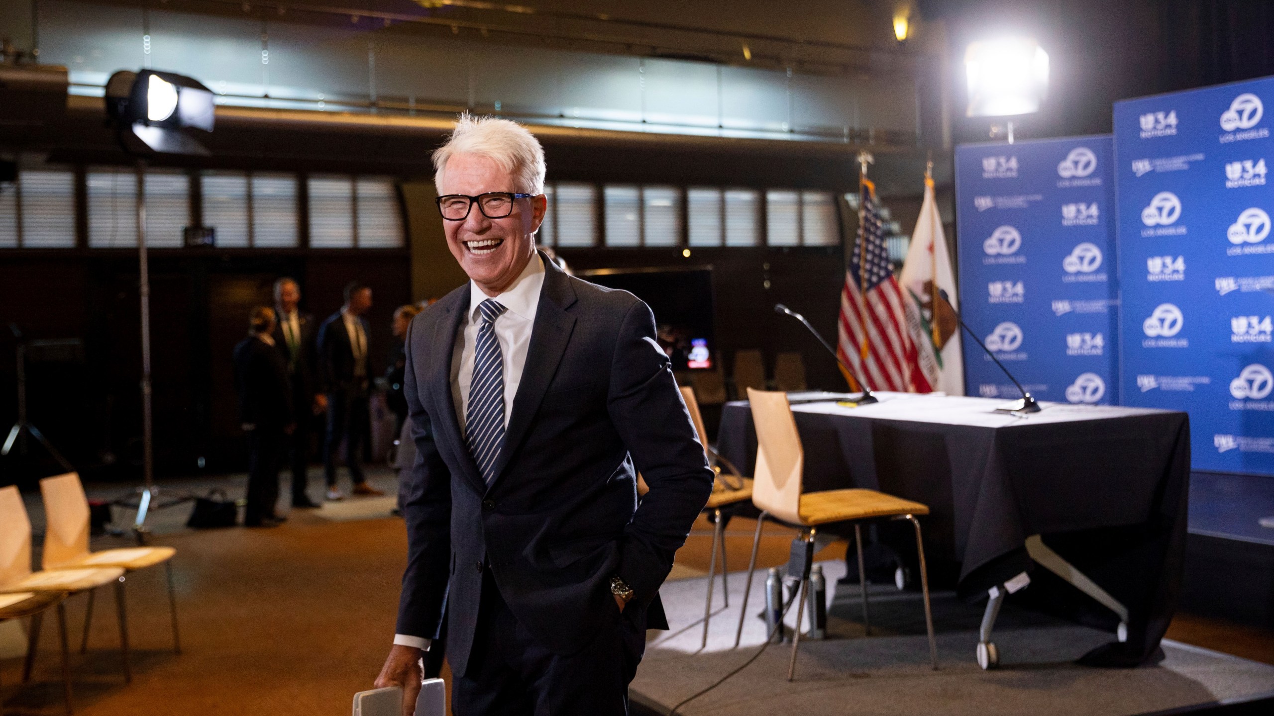 Los Angeles County District Attorney George Gascón greats audience members before the 2024 Los Angeles County district attorney candidate forum with former federal prosecutor Nathan Hochman in Los Angeles, Calif., Sunday, Sept. 29, 2024. (AP Photo/Ethan Swope)