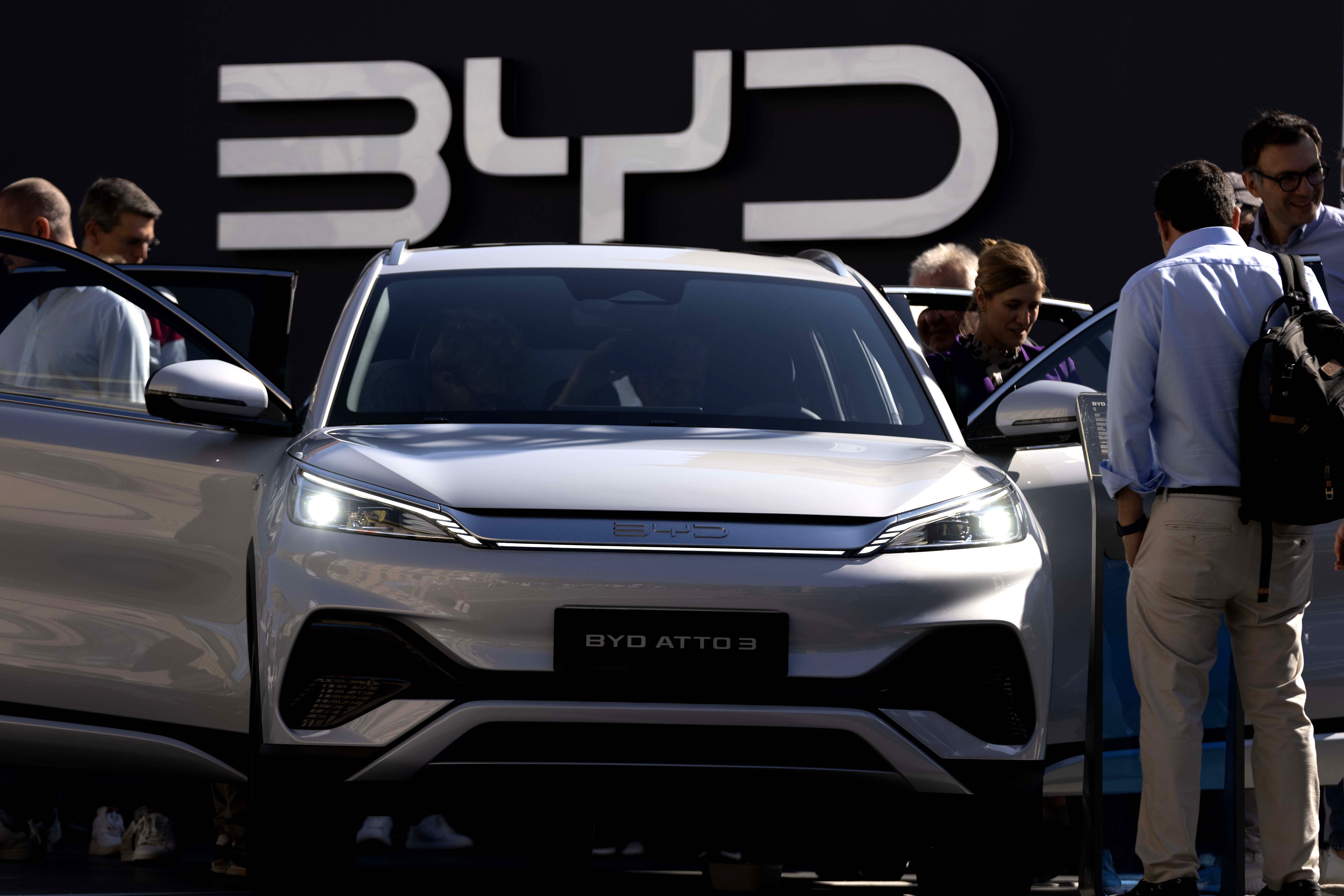 FILE - Visitors check the China made BYD ATTO 3 at the IAA motor show in Munich, Germany, on Sept. 8, 2023. (AP Photo/Matthias Schrader, File)