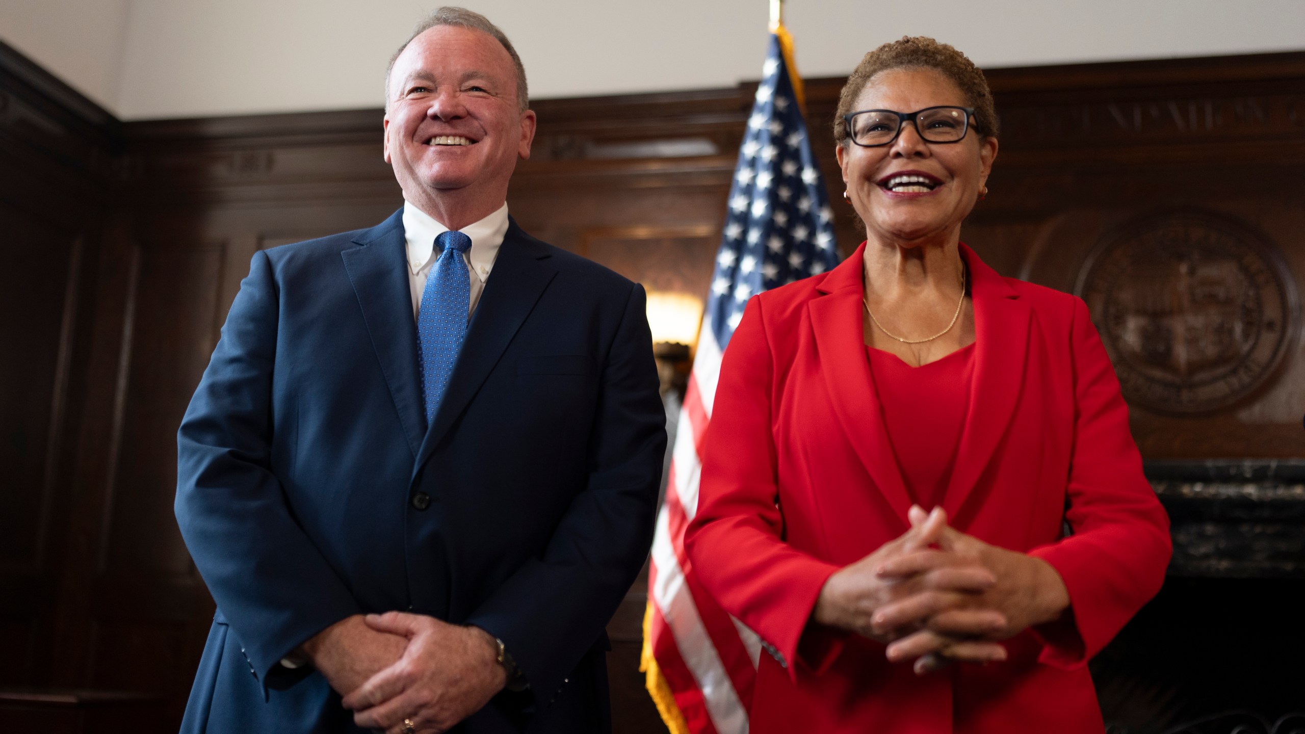 Los Angeles Mayor Karen Bass, right, and newly appointed police chief Jim McDonnell share a light moment during a news conference in Los Angeles, Friday, Oct. 4, 2024. (AP Photo/Jae C. Hong)