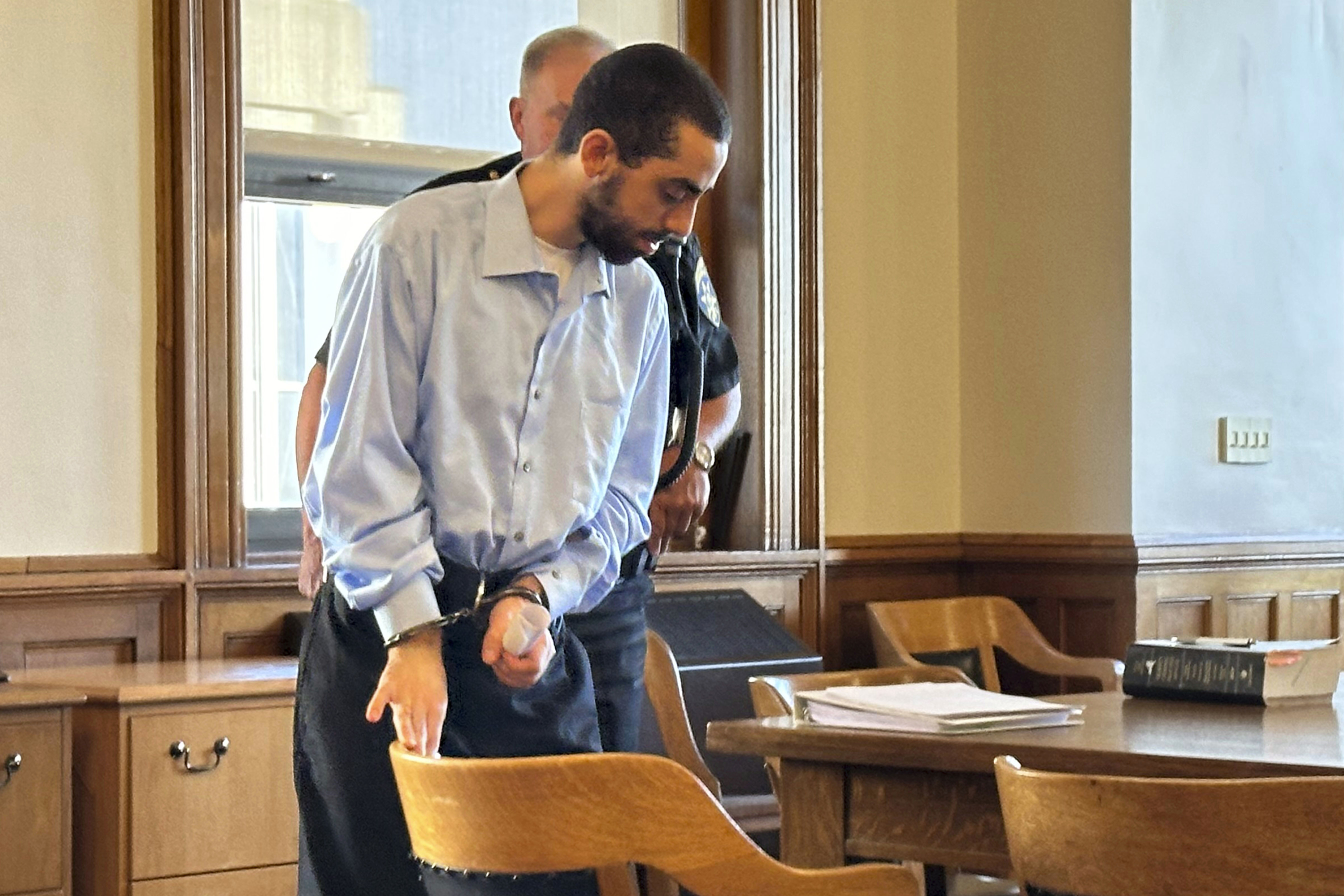 Had Matar, charged with attempted murder for stabbing author Salman Rushdie more than a dozen times, is escorted into the courtroom for a hearing in Chautauqua County Court, Friday, Oct. 4, 2024, in Mayville, N.Y. (AP Photo/Carolyn Thompson)