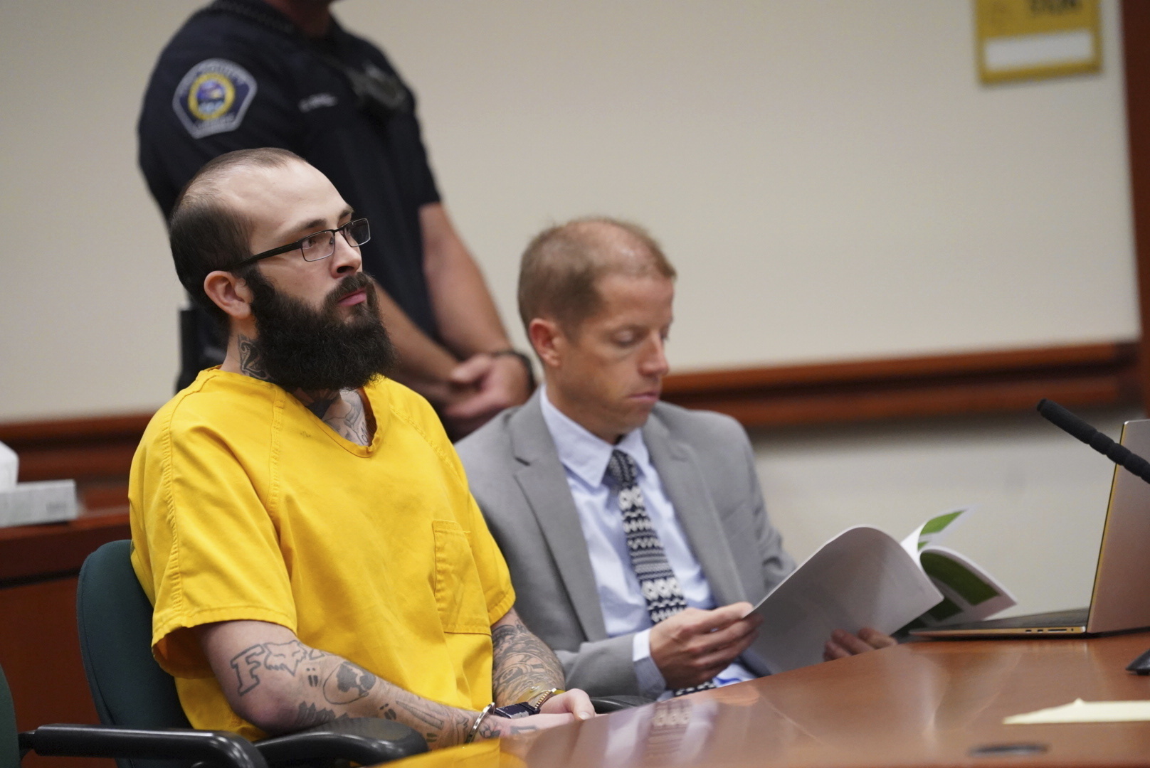 Nicholas Umphenour, 29, appears on court where was sentenced to life in prison, Friday, Oct. 4, 2024, at the Ada County Courthouse in Boise, Idaho, for helping a prison inmate escape by ambushing and shooting correctional officers at a Boise hospital. (Ali Al Saedi/KTVB via AP, Pool)