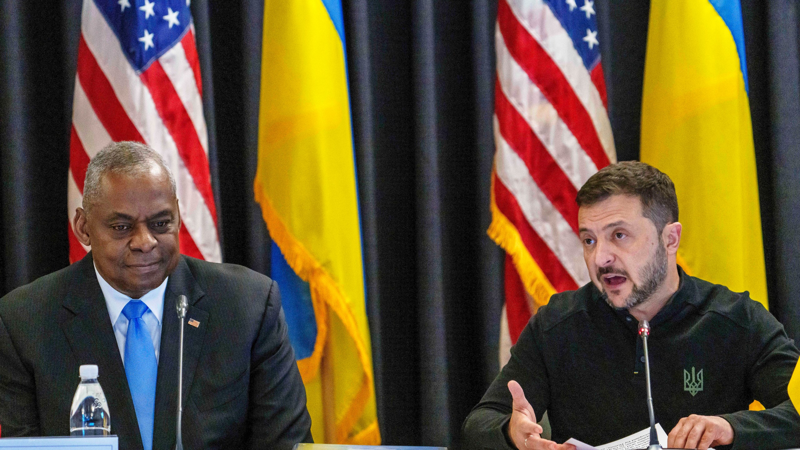 FILE - U.S. Defense Secretary Lloyd Austin, left, listens to Ukraine's President Volodymyr Zelenskyy during a meeting at Ramstein Air Base in Ramstein-Miesenbach, Germany, Friday, Sept. 6, 2024. (Andreas Arnold/dpa via AP, File)