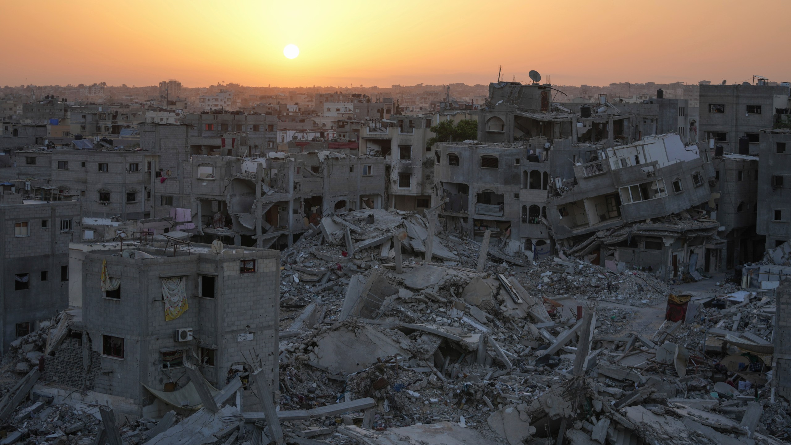 Destruction left by the Israeli air and ground offensive is seen in Khan Younis, Gaza Strip, Friday, Sept. 13, 2024. (AP Photo/Abdel Kareem Hana)