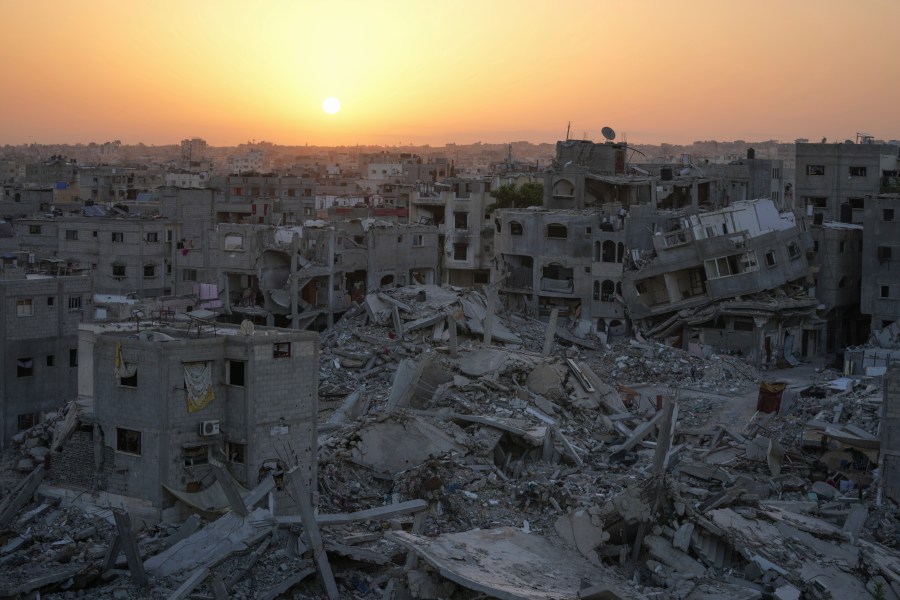 Destruction left by the Israeli air and ground offensive is seen in Khan Younis, Gaza Strip, Friday, Sept. 13, 2024. (AP Photo/Abdel Kareem Hana)