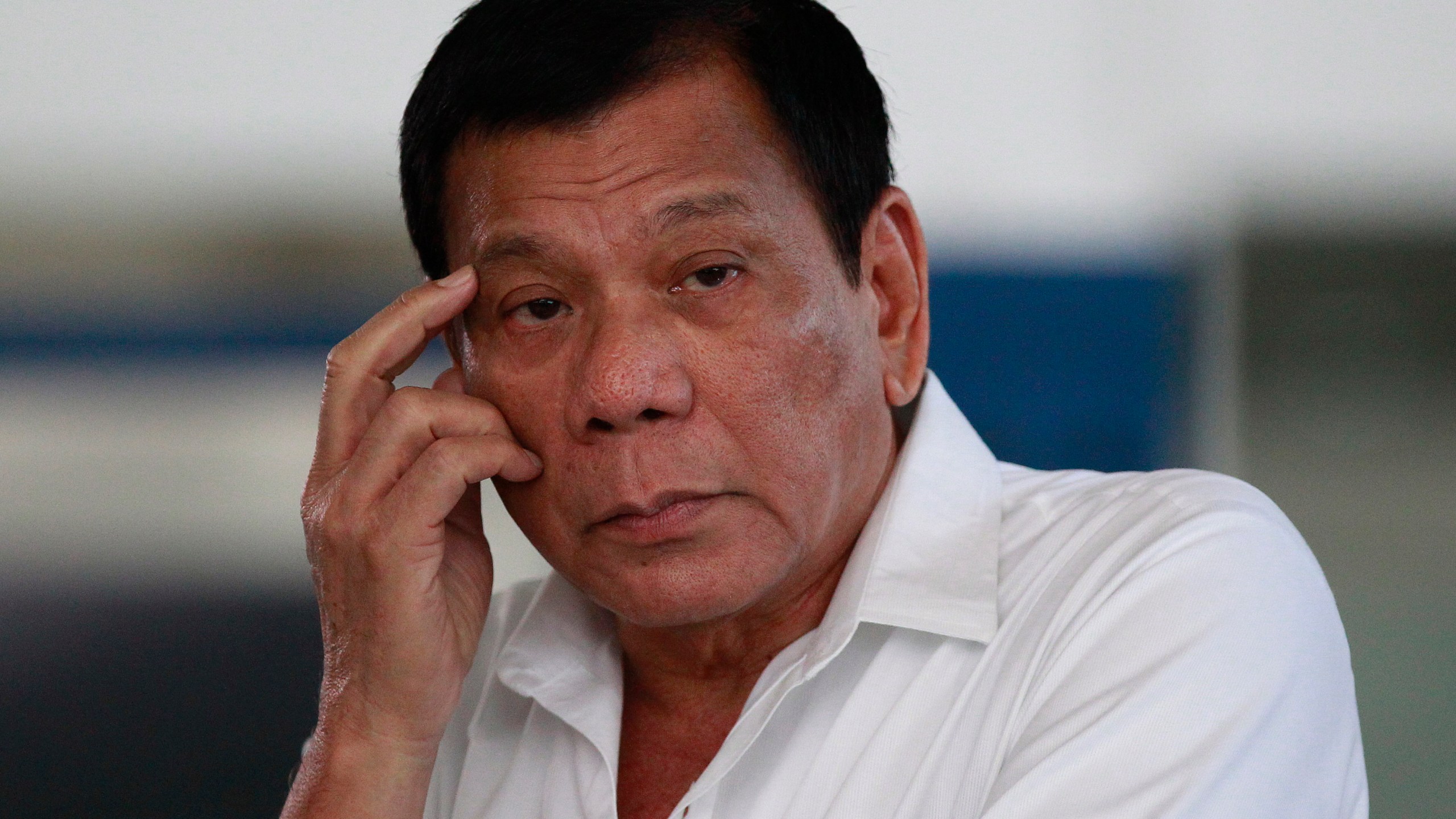 FILE -Philippine President Rodrigo Duterte listens to a question from reporters at Manila's International Airport, Philippines on, Nov. 9, 2016. (AP Photo/Aaron Favila, File)