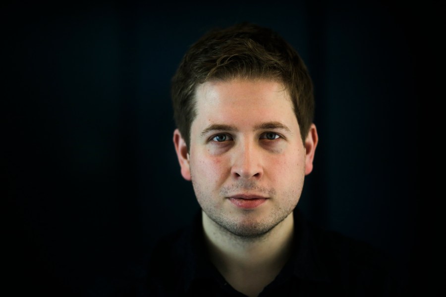 FILE - In this Feb. 14, 2018 photo, Kevin Kuehnert, leader of Social Democratic Party's, SPD, youth organization JUSOS poses for a portrait after an interview with the Associated Press at the party's headquarters in Berlin. (AP Photo/Markus Schreiber, file)