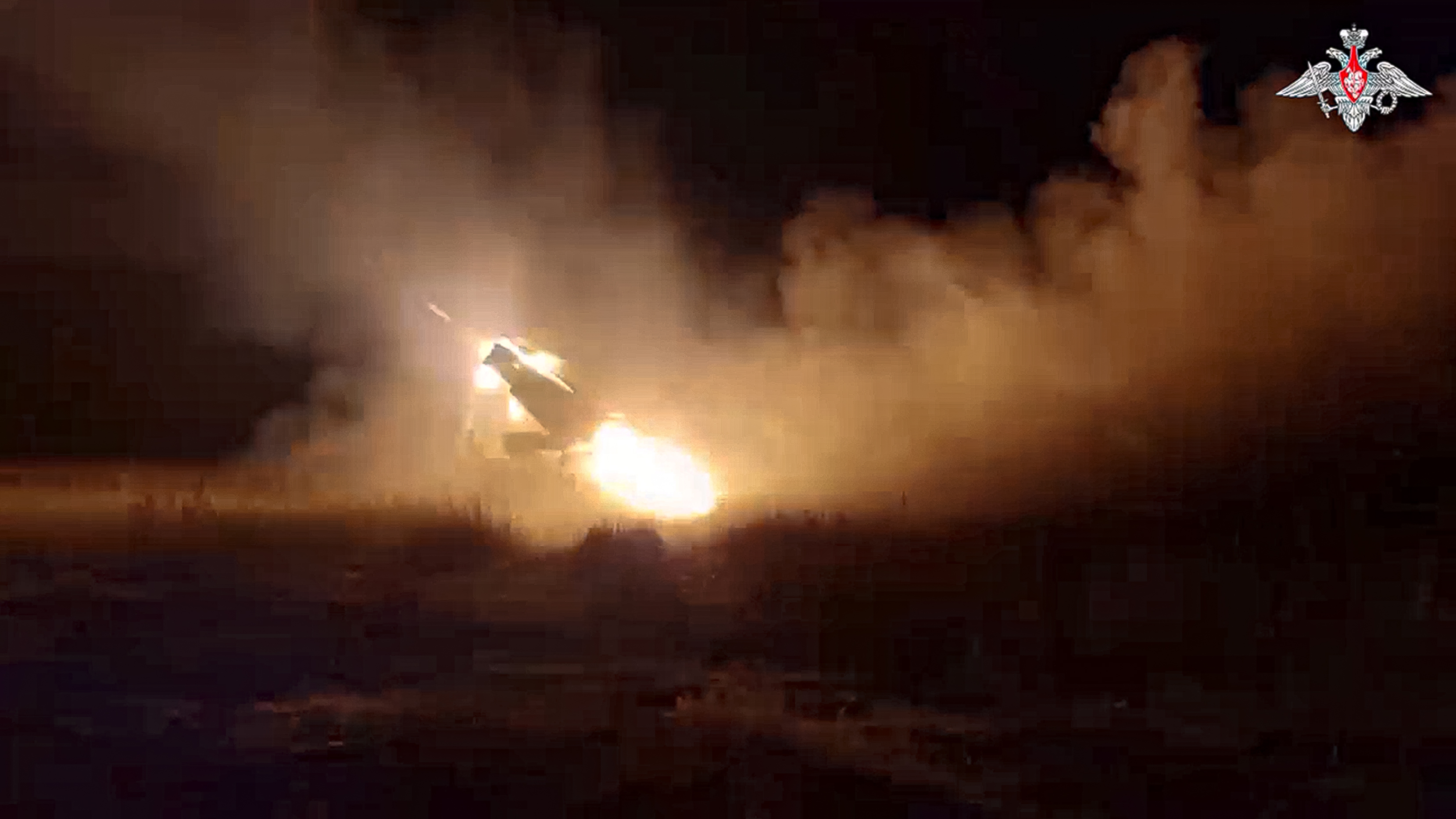 In this photo taken from video released by Russian Defense Ministry Press Service on Sunday, Oct. 6, 2024, a Russian Army "Grad" self-propelled 122 mm multiple rocket launcher fires rockets toward Ukrainian position at an undisclosed location. (Russian Defense Ministry Press Service photo via AP)