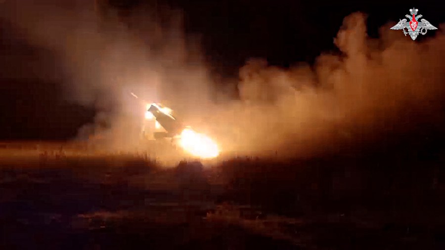 In this photo taken from video released by Russian Defense Ministry Press Service on Sunday, Oct. 6, 2024, a Russian Army "Grad" self-propelled 122 mm multiple rocket launcher fires rockets toward Ukrainian position at an undisclosed location. (Russian Defense Ministry Press Service photo via AP)