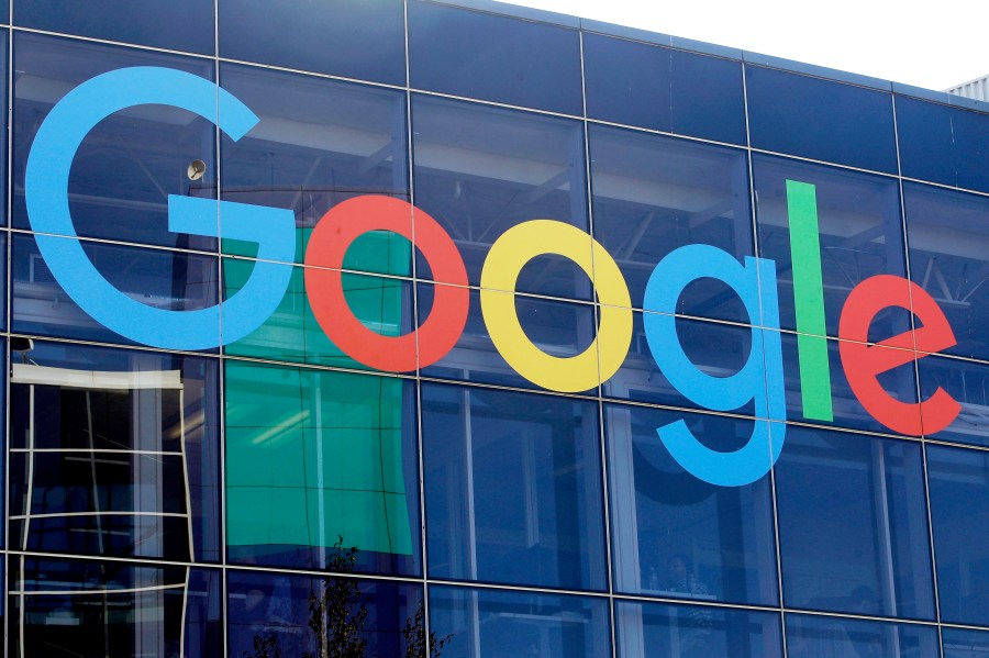 FILE - A sign is shown on a Google building at their campus in Mountain View, Calif., on Sept. 24, 2019. (AP Photo/Jeff Chiu, File)