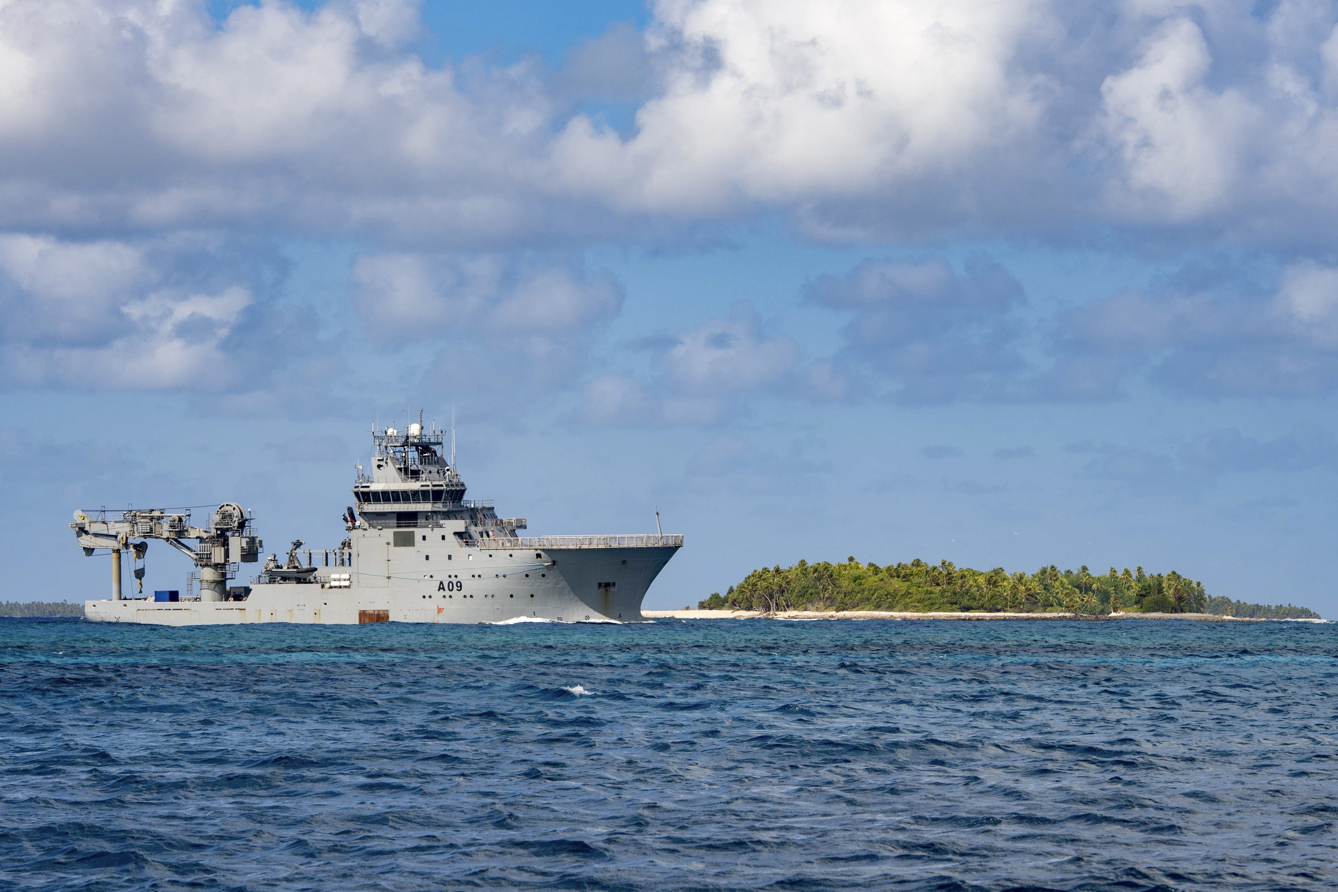 In this image released by New Zealand Defence Force (NZDF), HMNZS Manawanui arrives in Funafuti Lagoon, Tuvalu, on Sept. 7, 2022. (PO Christopher Weissenborn/NZDF via AP)