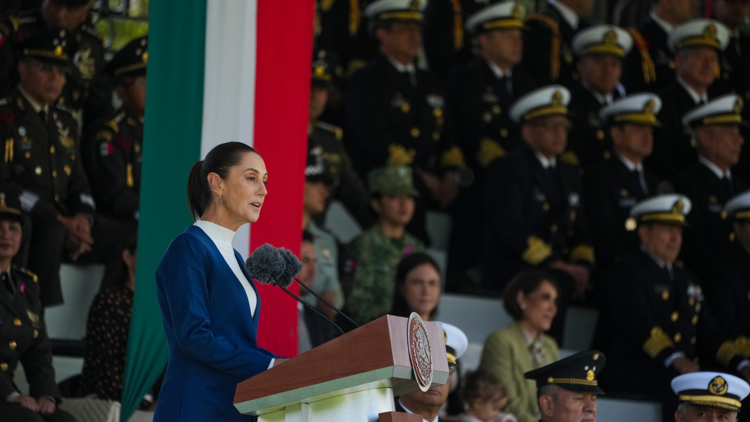 Mexican President Claudia Sheinbaum addresses the Armed Forces at Campo Marte in Mexico City, Thursday, Oct. 3, 2024. (AP Photo/Fernando Llano)