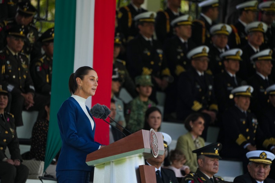 Mexican President Claudia Sheinbaum addresses the Armed Forces at Campo Marte in Mexico City, Thursday, Oct. 3, 2024. (AP Photo/Fernando Llano)