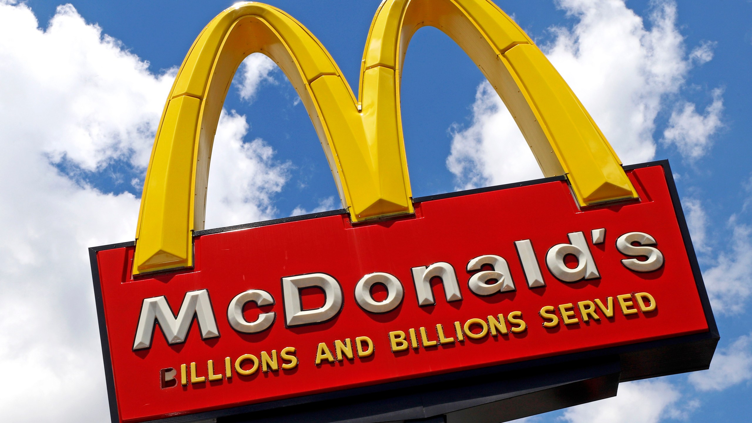 FILE - The sign outside a McDonald's restaurant is seen in Pittsburgh, June 25, 2019. (AP Photo/Gene J. Puskar, File)