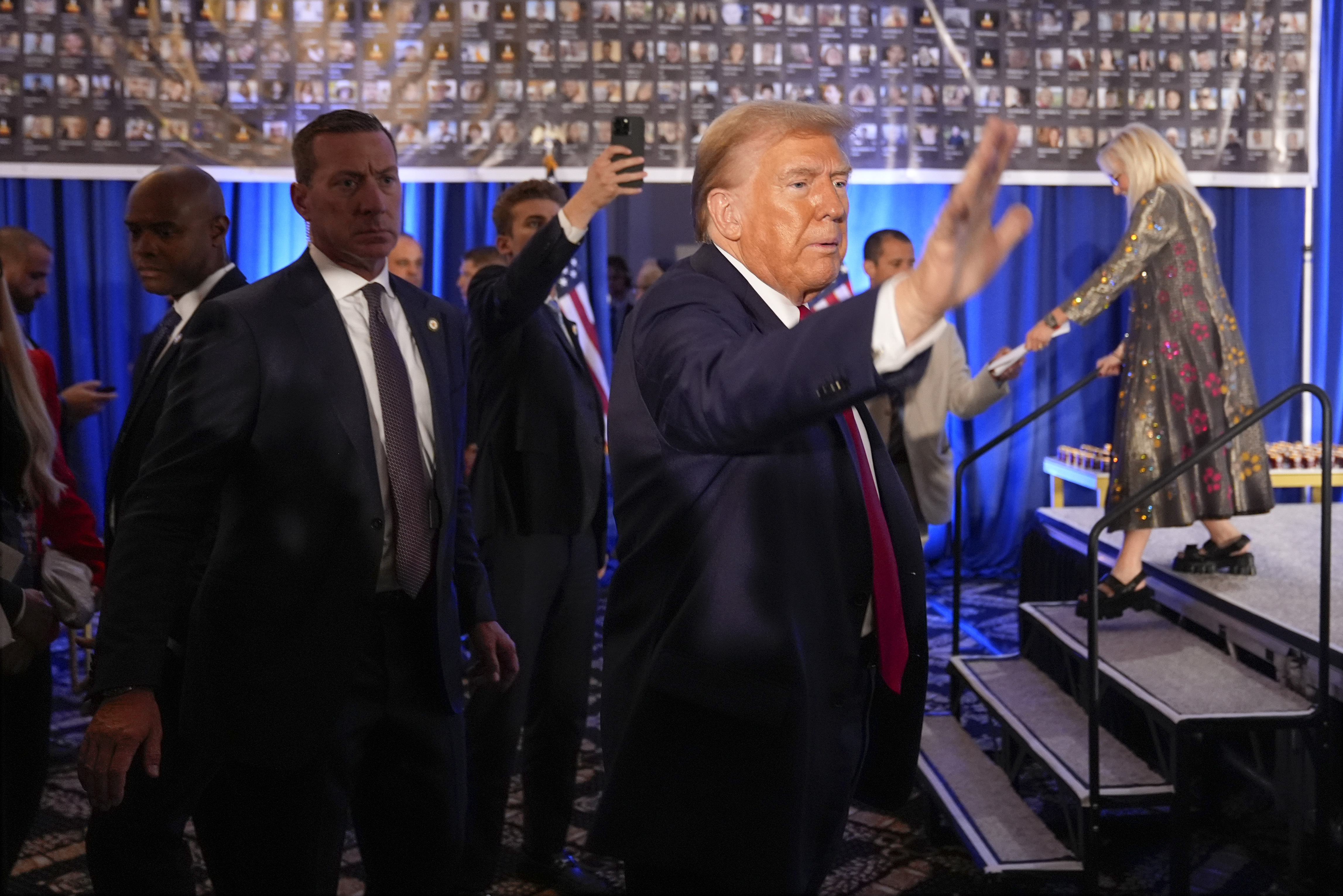 Republican presidential nominee former President Donald Trump waves as he departs an event marking one year since the Oct. 7 Hamas attack on Israel, Monday, Oct. 7, 2024, in Miami. (AP Photo/Alex Brandon)