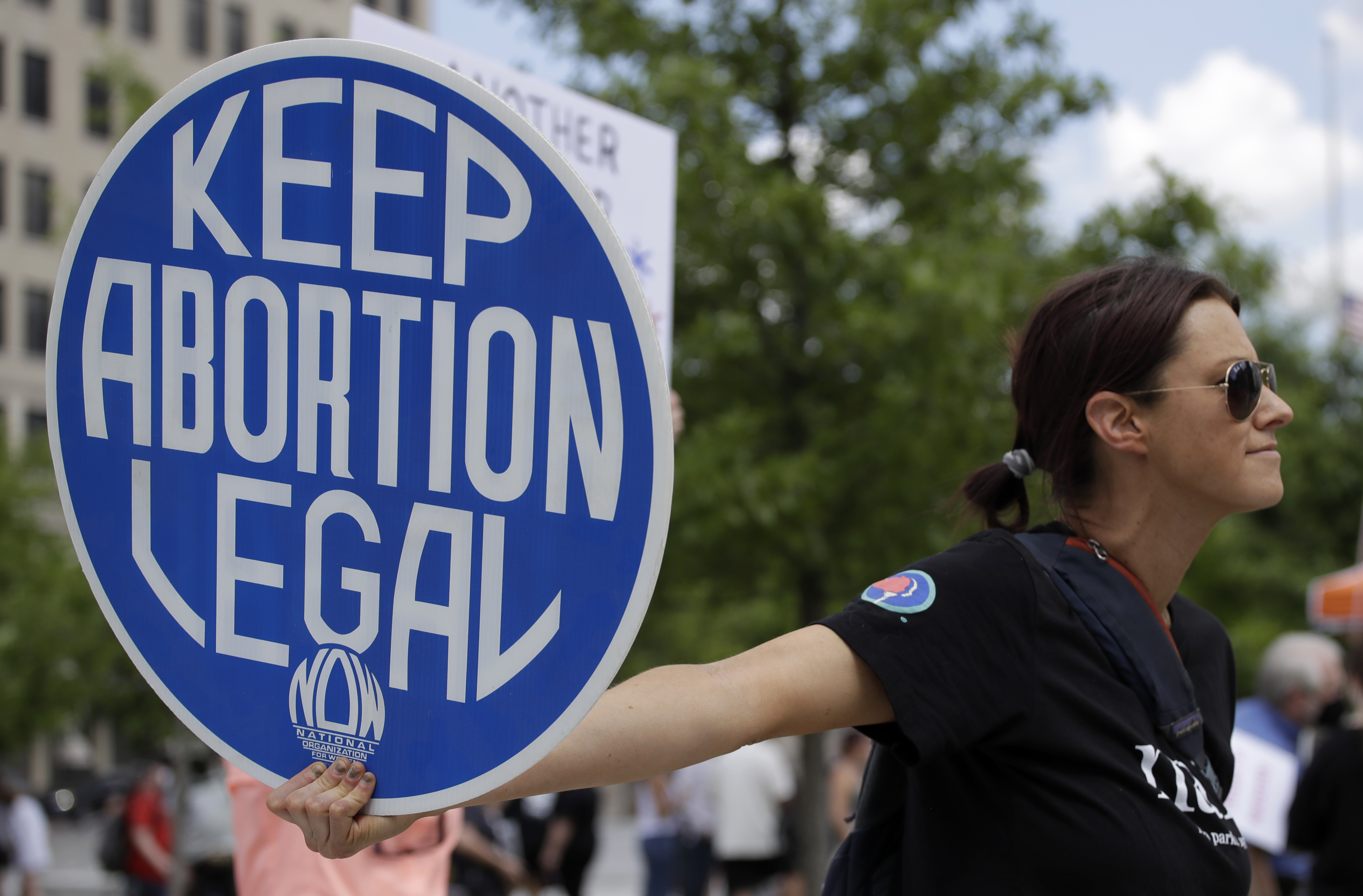 FILE - An. Abortion rights demonstrator holds a sign during a rally on May 14, 2022, in Chattanooga, Tenn. (AP Photo/Ben Margot, File)