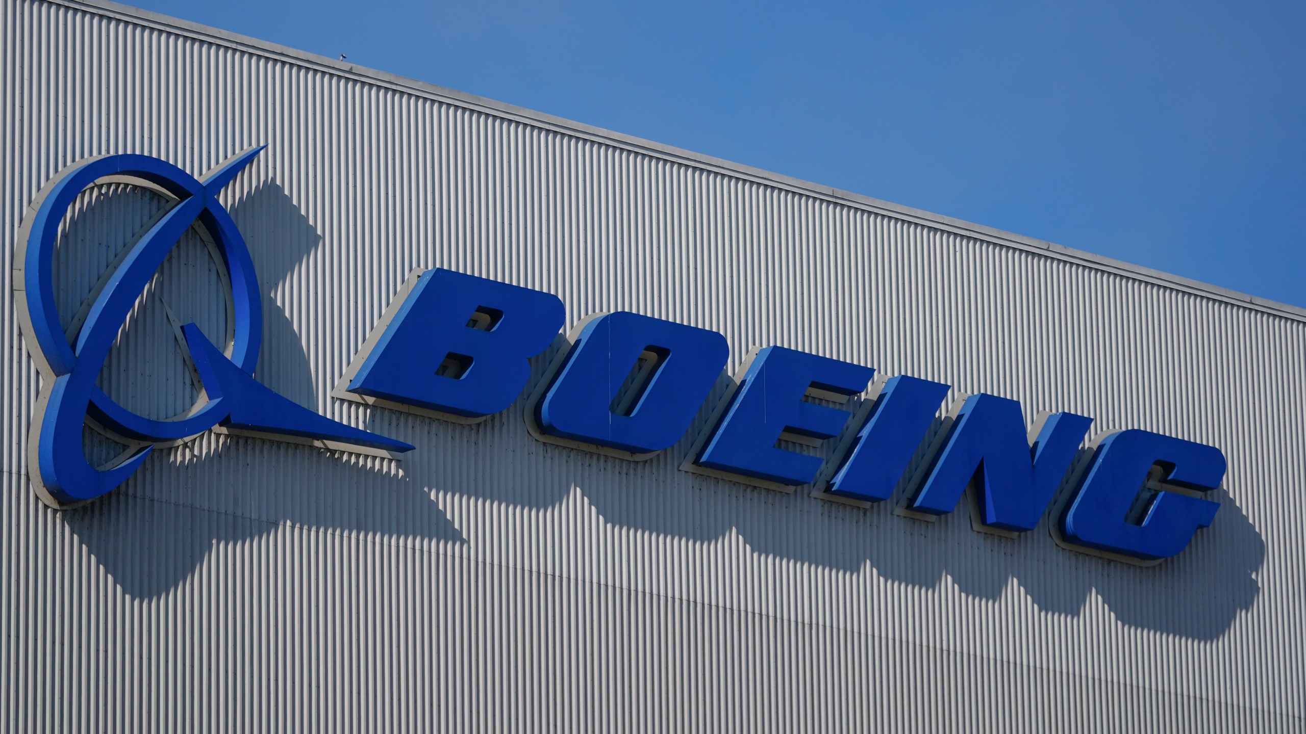 FILE - The Boeing logo is displayed at the company's factory Tuesday, Sept. 24, 2024, in Renton, Wash. (AP Photo/Lindsey Wasson, File)