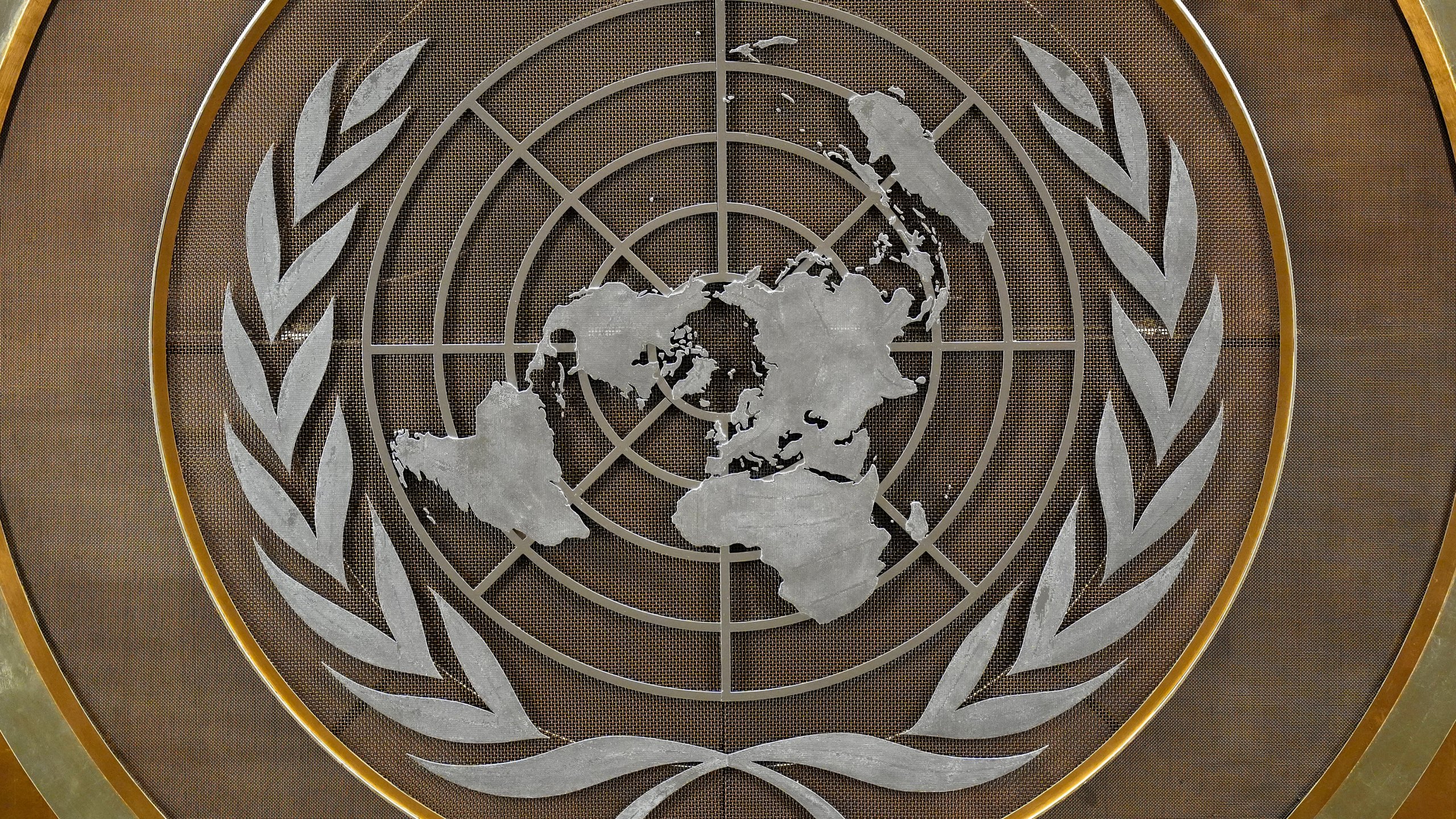 FILE - The United Nations logo is seen inside the 79th session of the United Nations General Assembly, Tuesday, Sept. 24, 2024. (AP Photo/Pamela Smith, File)