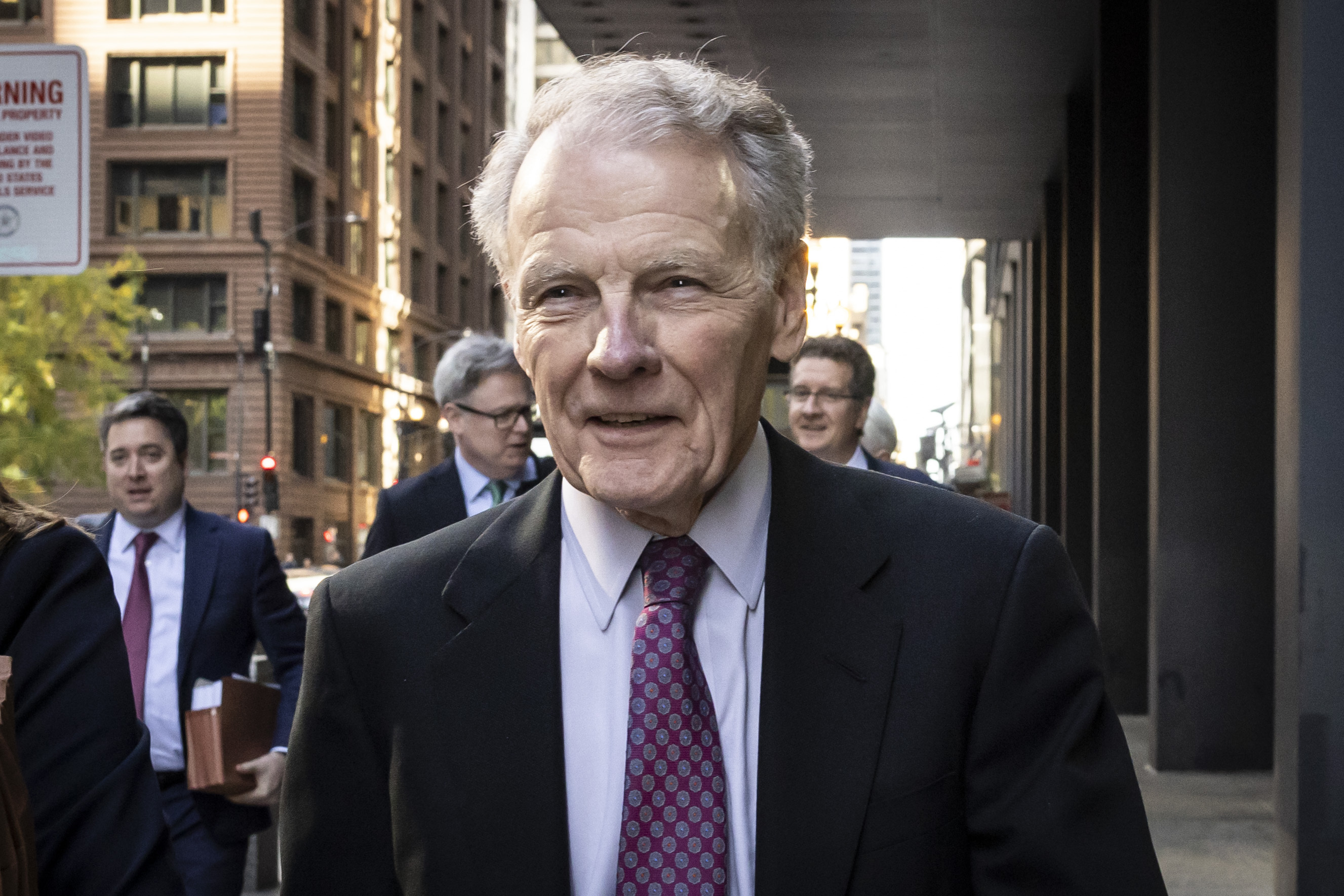 Illinois' former House Speaker Michael Madigan, charged in a multimillion-dollar racketeering and bribery scheme that included the state’s largest utility, ComEd, walks out of the Dirksen Federal Courthouse, Wednesday, Oct. 9, 2024 in Chicago. (Ashlee Rezin/Chicago Sun-Times via AP)