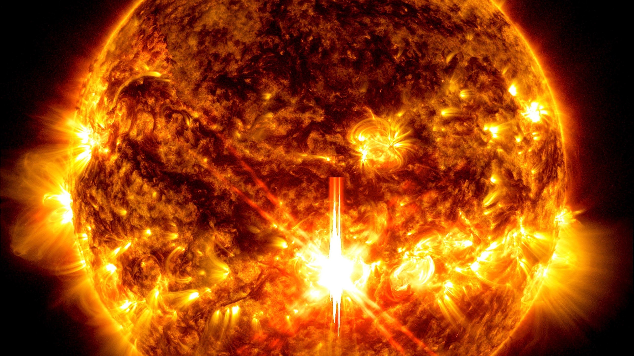 FILE - This photo provided by NASA, taken by the Solar Dynamics Observatory, shows a solar flare, the bright flash in the center of the image on Oct. 3, 2024. (Solar Dynamics Observatory/NASA via AP, File)