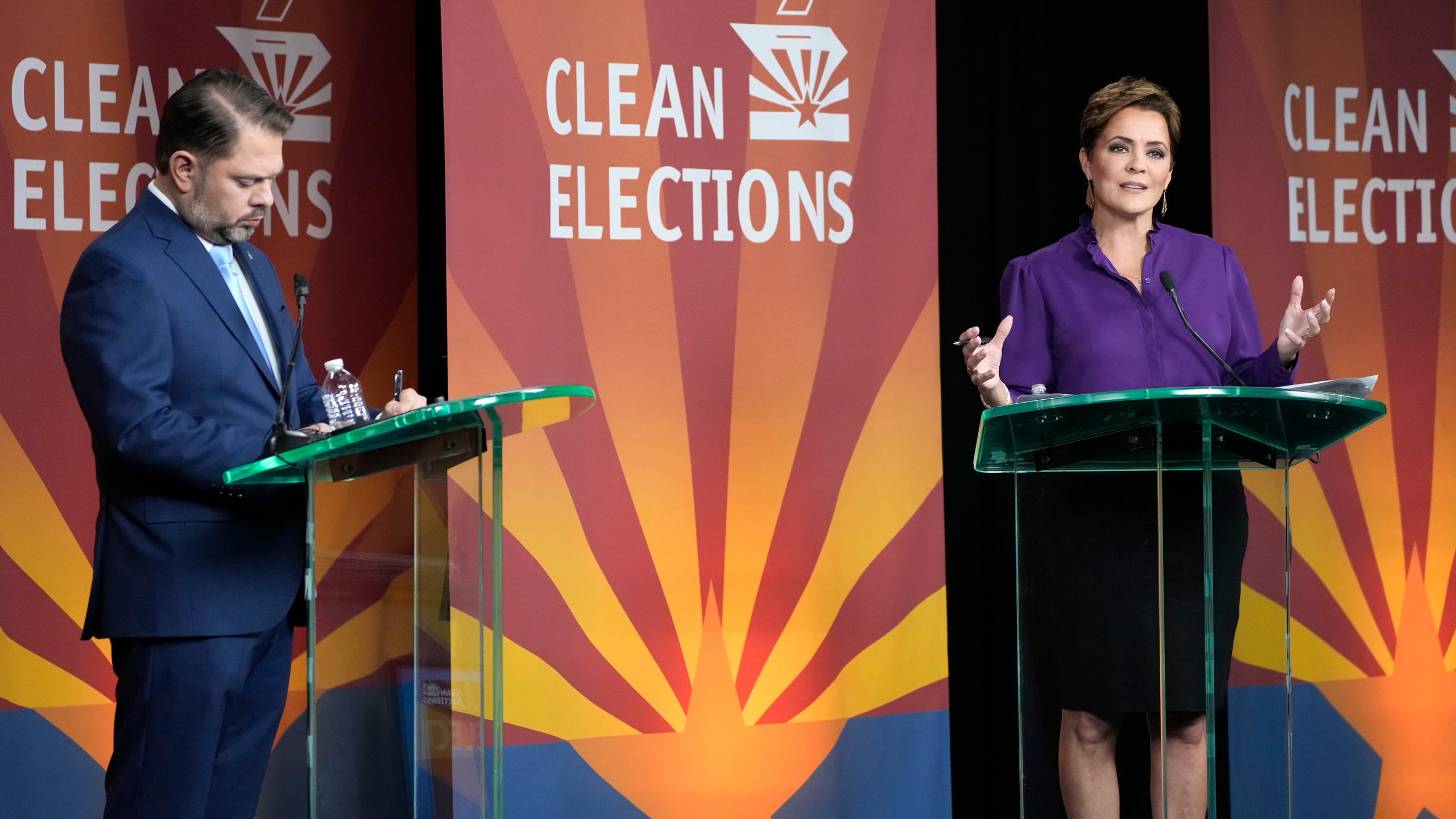 U.S. Senate candidates Rep. Ruben Gallego, D-Ariz., left, and Republican challenger Kari Lake participate in their debate, Wednesday, Oct. 9, 2024, in Phoenix. (Cheryl Evans/Arizona Republic via AP)