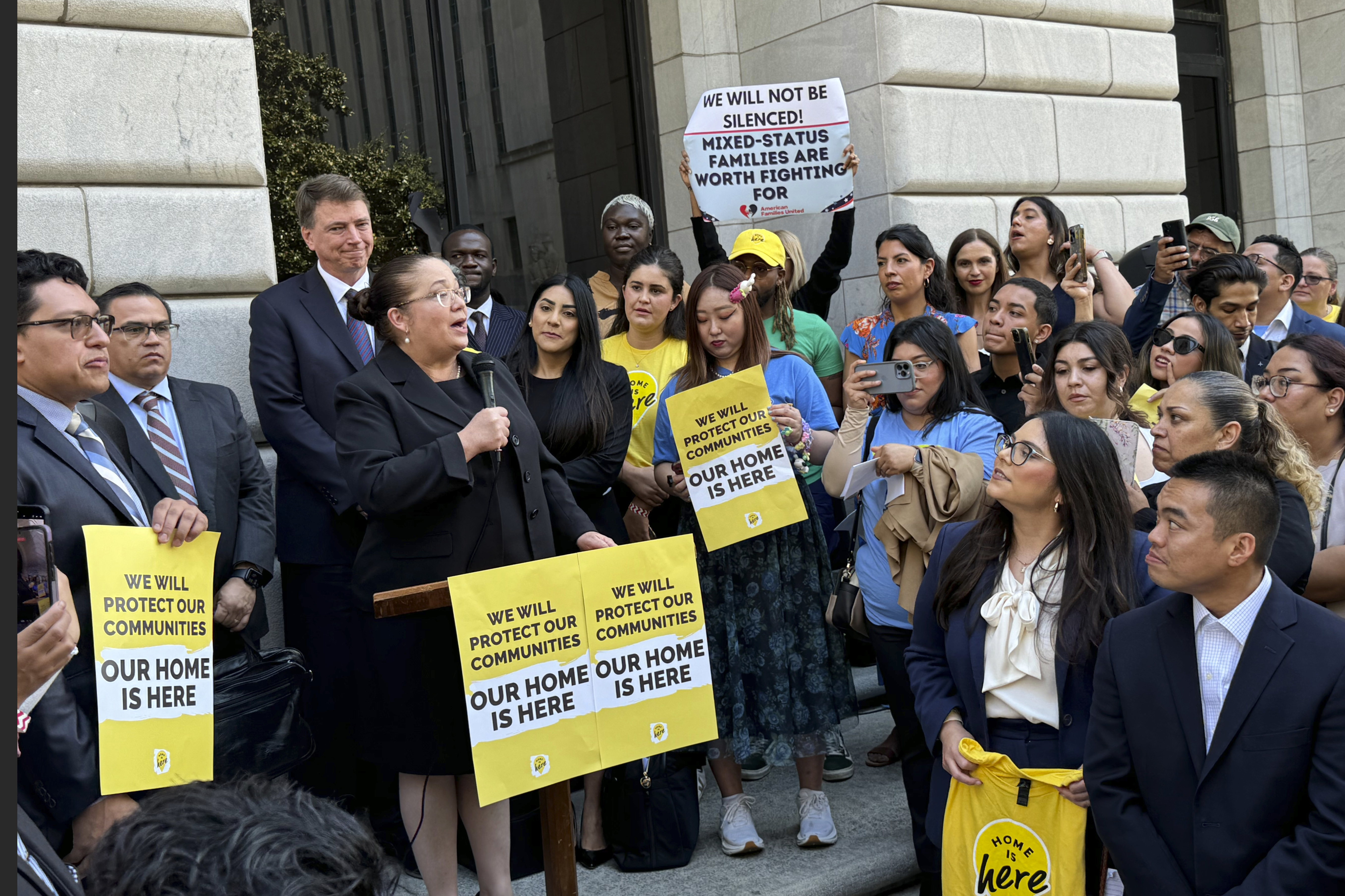 Nina Perales, vice president of litigation for the Mexican American Legal Defense and Educational Fund, speaks to DACA supporters after appearing in federal appeals court in New Orleans to defend the policy on Thursday, Oct. 10, 2024. (AP Photo/Jack Brook)