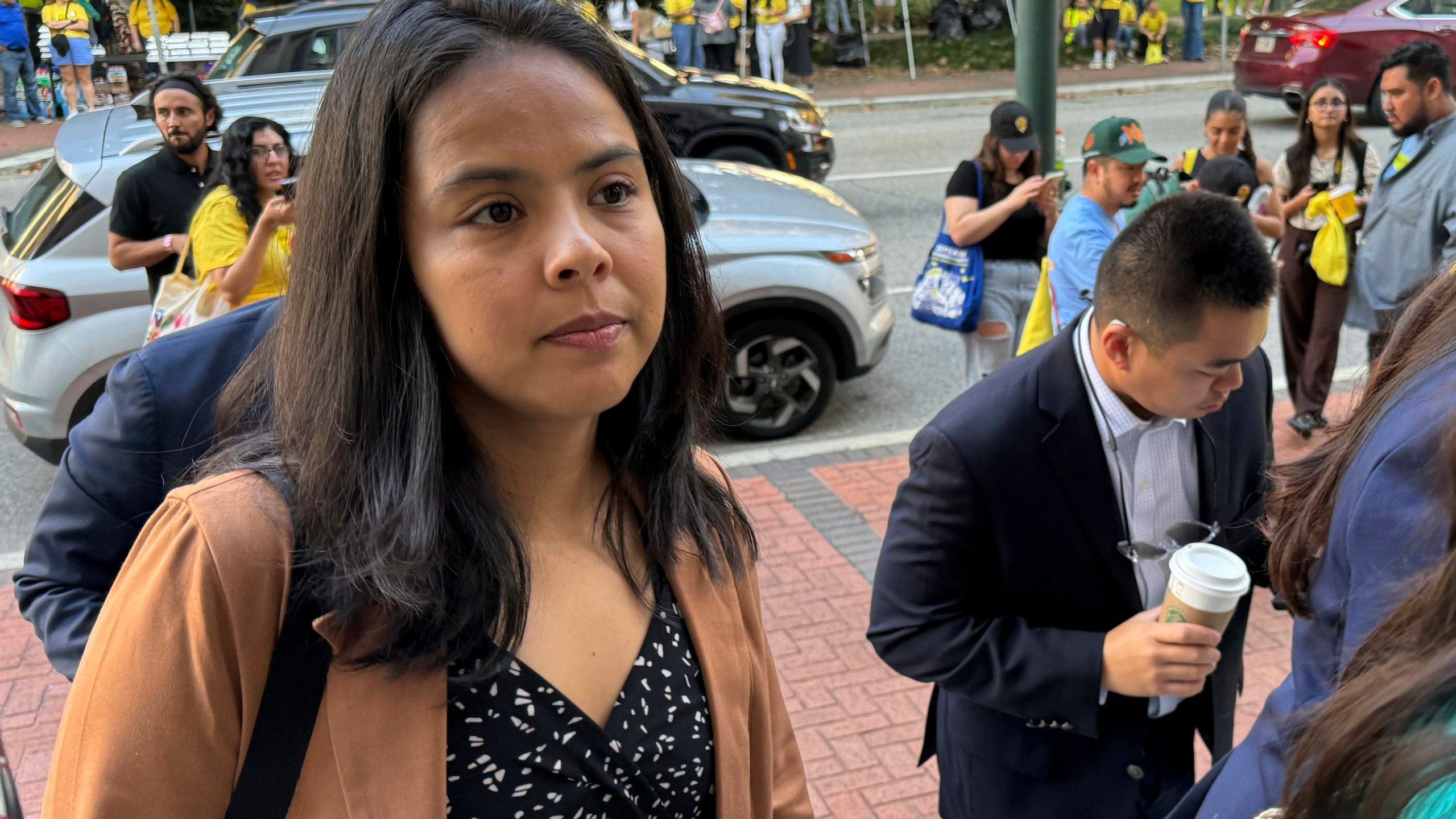 DACA-recipient María Rocha-Carrillo, 37, arrives in federal appellate court in New Orleans on Thursday, Oct. 10, 2024 to hear lawyers debate the future of the policy that has allowed her and hundreds of thousands of others to remain in the U.S. legally. (AP Photo/Jack Brook)