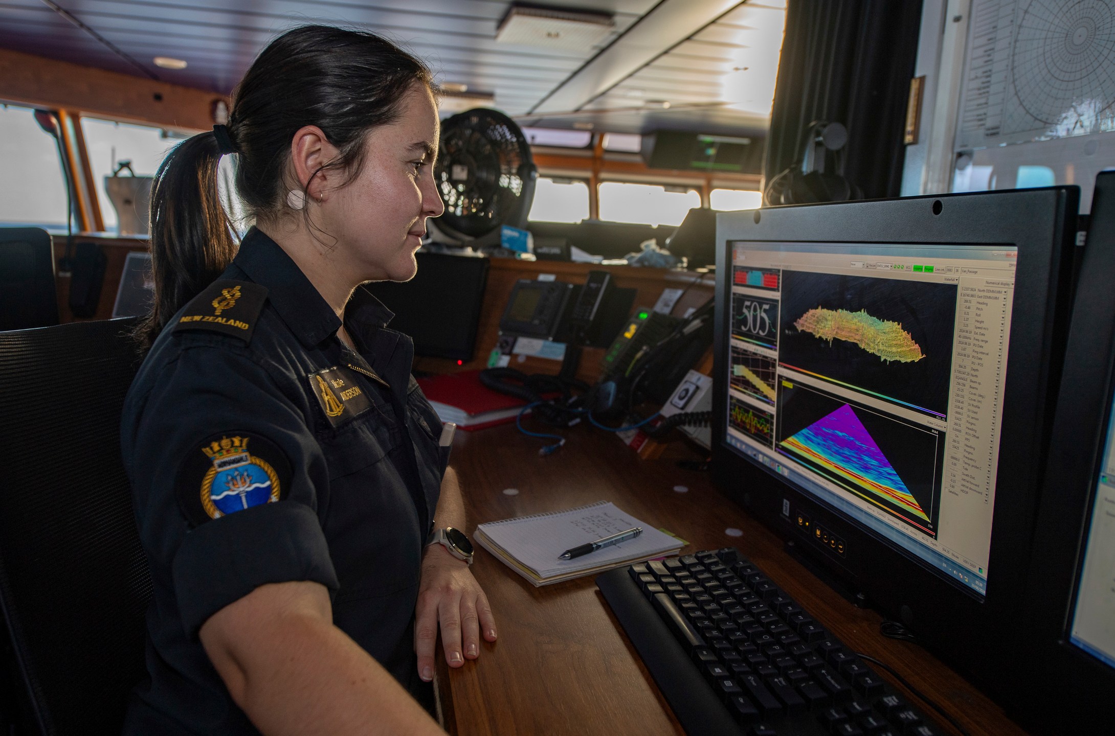 In this undated photo provided by New Zealand's Defence Public Affairs, a hydrographer surveys uncharted positions during the transit to Vanuatu on Op Calypso onboard HMNZS Manawanui. (Petty Officer Chris Weissenborn/Defence Public Affairs via AP)