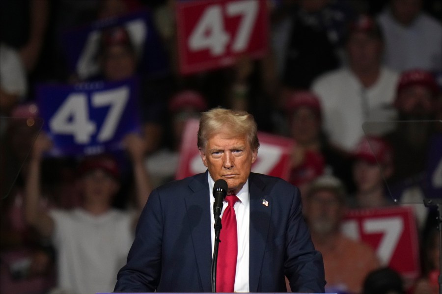 Republican presidential nominee former President Donald Trump speaks at a campaign rally at Grand Sierra Resort and Casino, Friday, Oct. 11, 2024, in Reno, Nev. (AP Photo/Jae C. Hong)