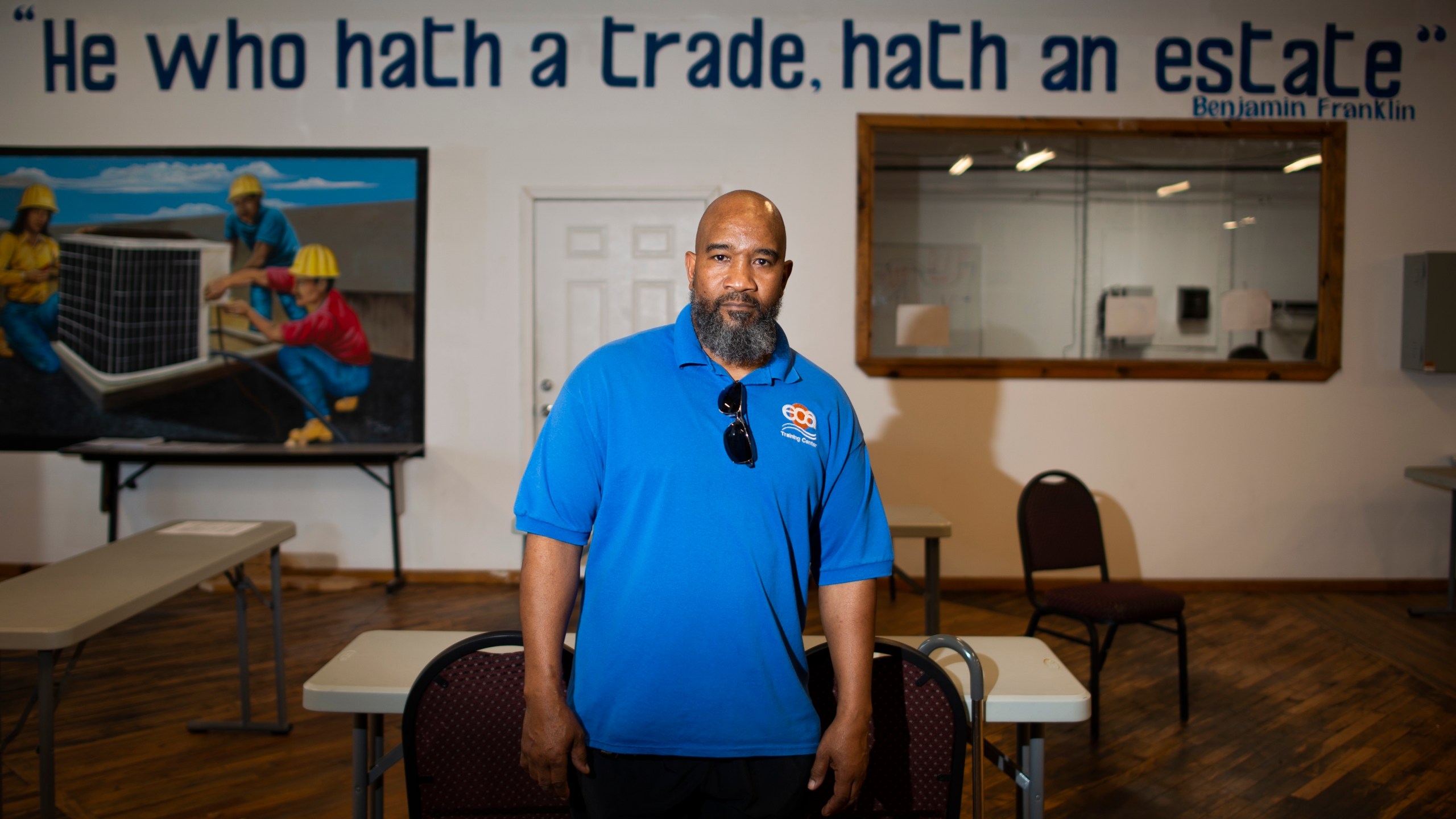 Jackie Robinson, an instructor at the Energy Coordinating Agency, a nonprofit focused in part on energy equity, poses inside the facility on Tuesday, July 2, 2024, in Philadelphia. (AP Photo/Joe Lamberti)