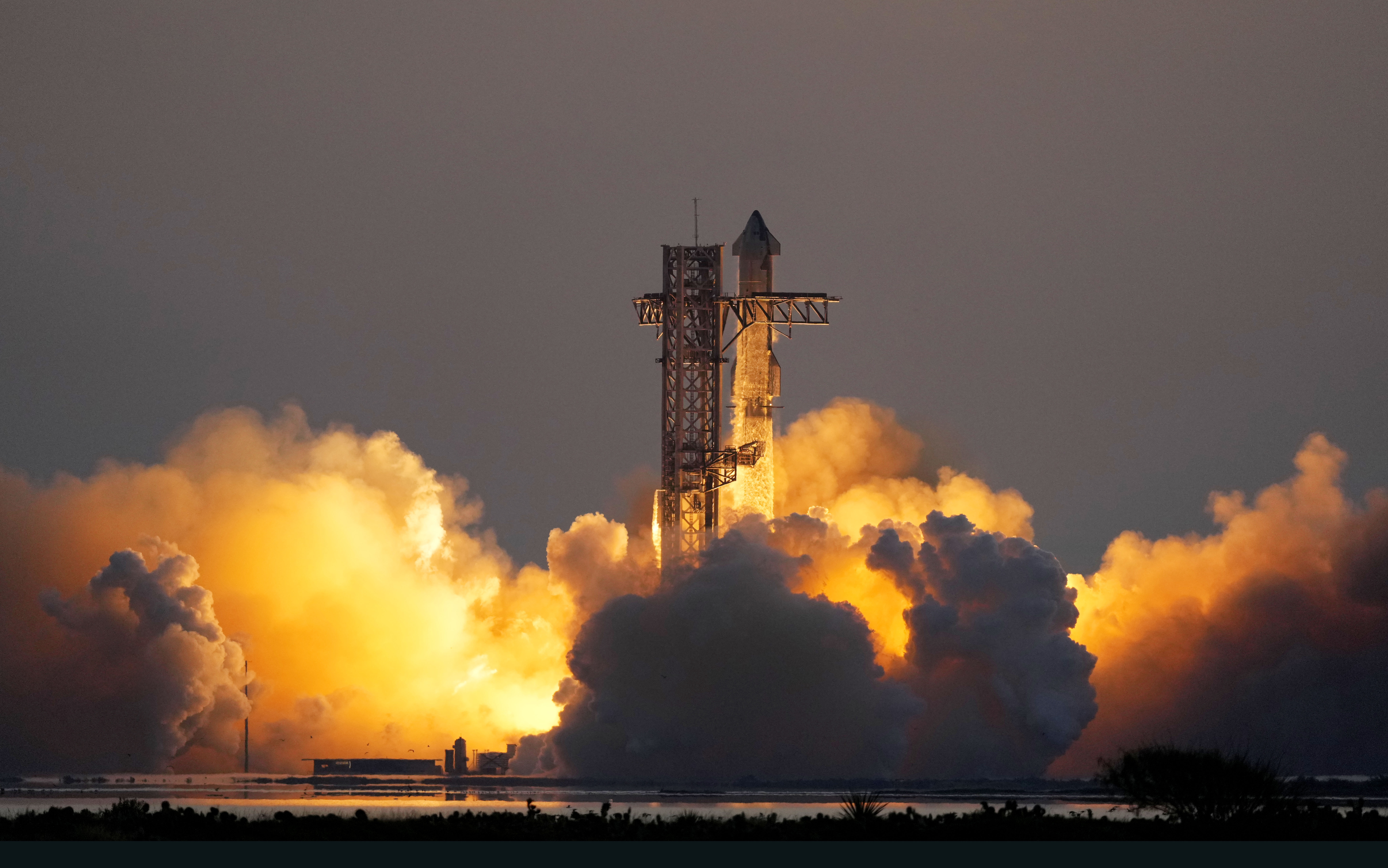 SpaceX's mega rocket Starship lifts off from Starbase for a test flight Sunday, Oct. 13, 2024, in Boca Chica,, Texas. (AP Photo/Eric Gay)