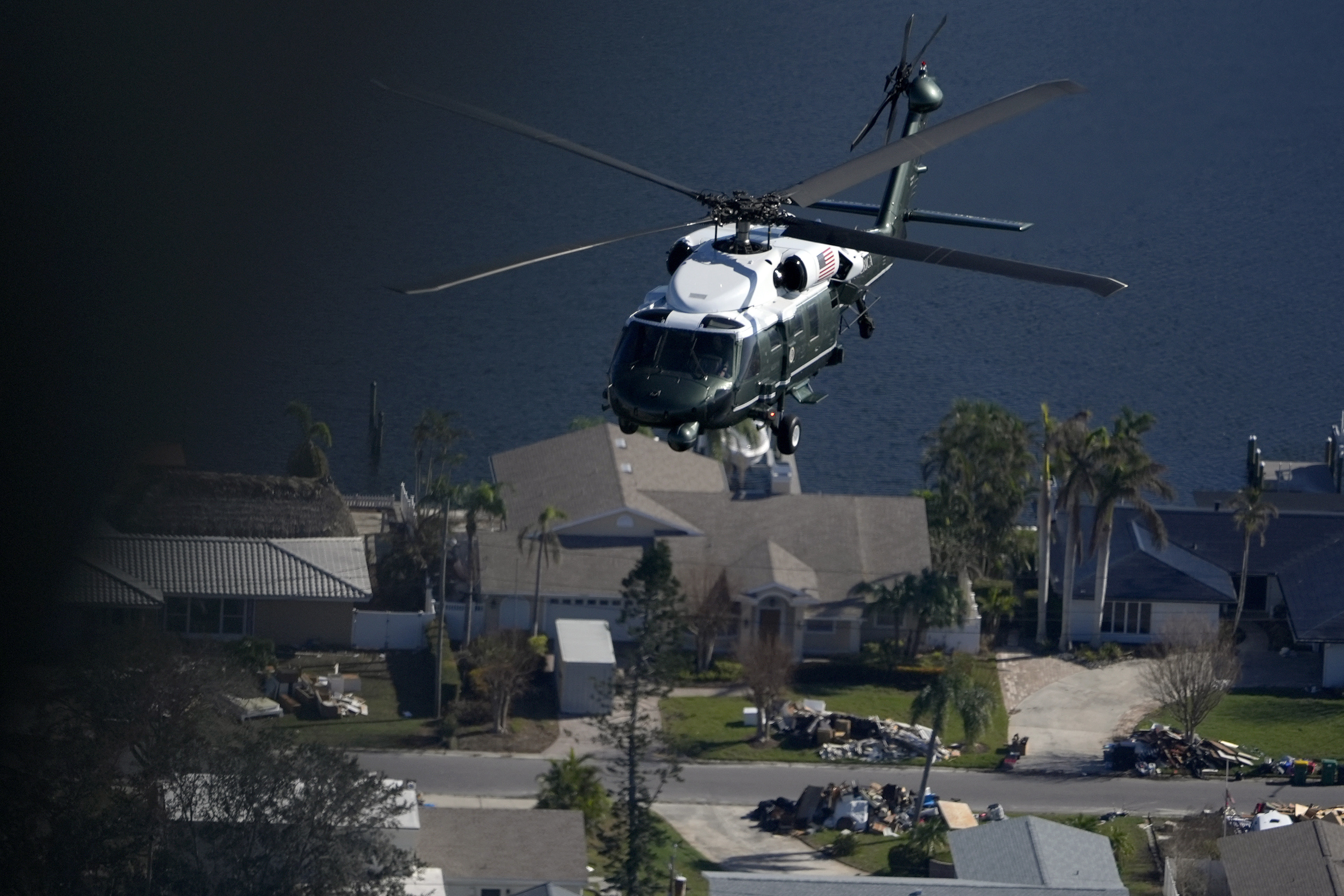 With President Joe Biden aboard, Marine One surveys areas affected by Hurricane Milton in Florida, from Tampa to St. Petersburg, Sunday, Oct. 13, 2024. (AP Photo/Manuel Balce Ceneta)