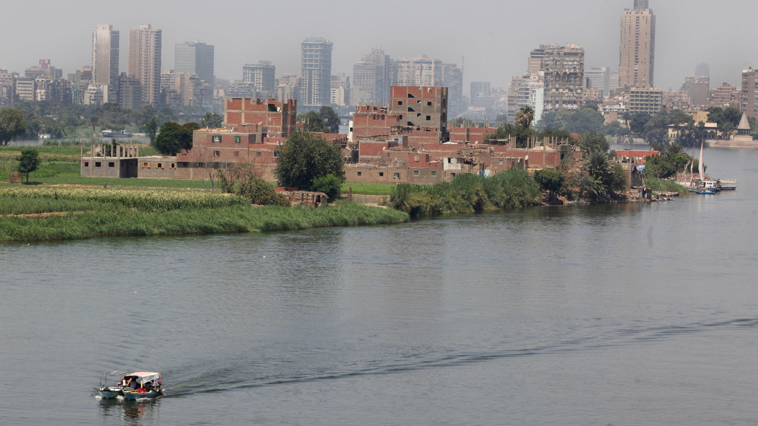 FILE - A fisherman's boat sails along the River Nile in Cairo, Egypt, Saturday, Sept. 3, 2011. (AP Photo/Amr Nabil, File)