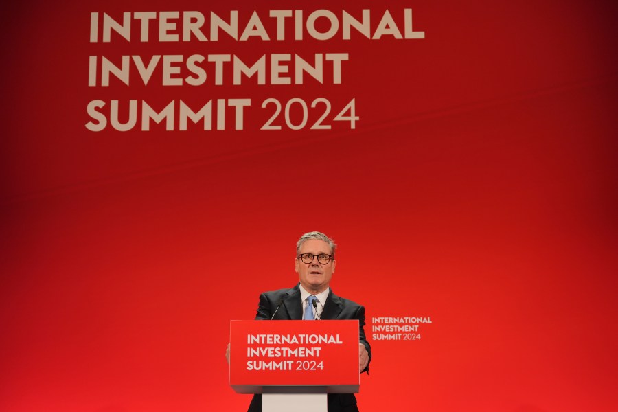 Britain's Prime Minister Keir Starmer speaks during the International Investment Summit in London, Monday, Oct. 14, 2024. (Jonathan Brady/Pool Photo via AP)