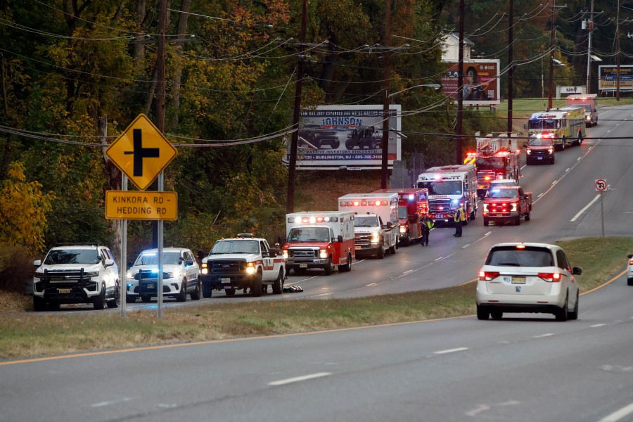 Fire and rescue personnel are on the scene of a train accident in Mansfield Twp., Burlington County, Monday, Oct. 14, 2024. (Alejandro A. Alvarez/The Philadelphia Inquirer via AP)