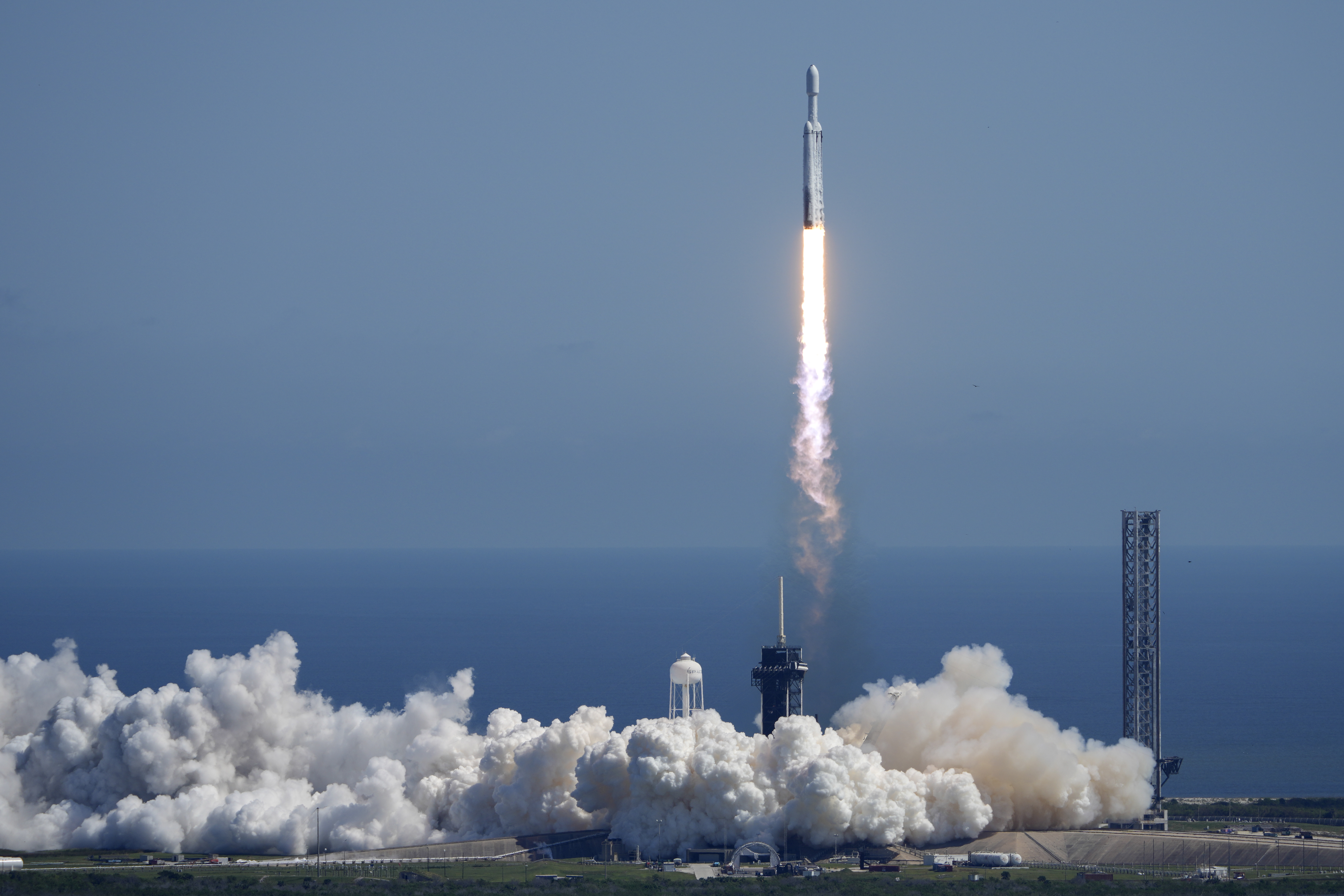 A SpaceX Falcon Heavy rocket with a NASA spacecraft bound for Jupiter lifts off from pad 39A at the Kennedy Space Center Monday, Oct. 14, 2024 in Cape Canaveral, Fla. (AP Photo/John Raoux)