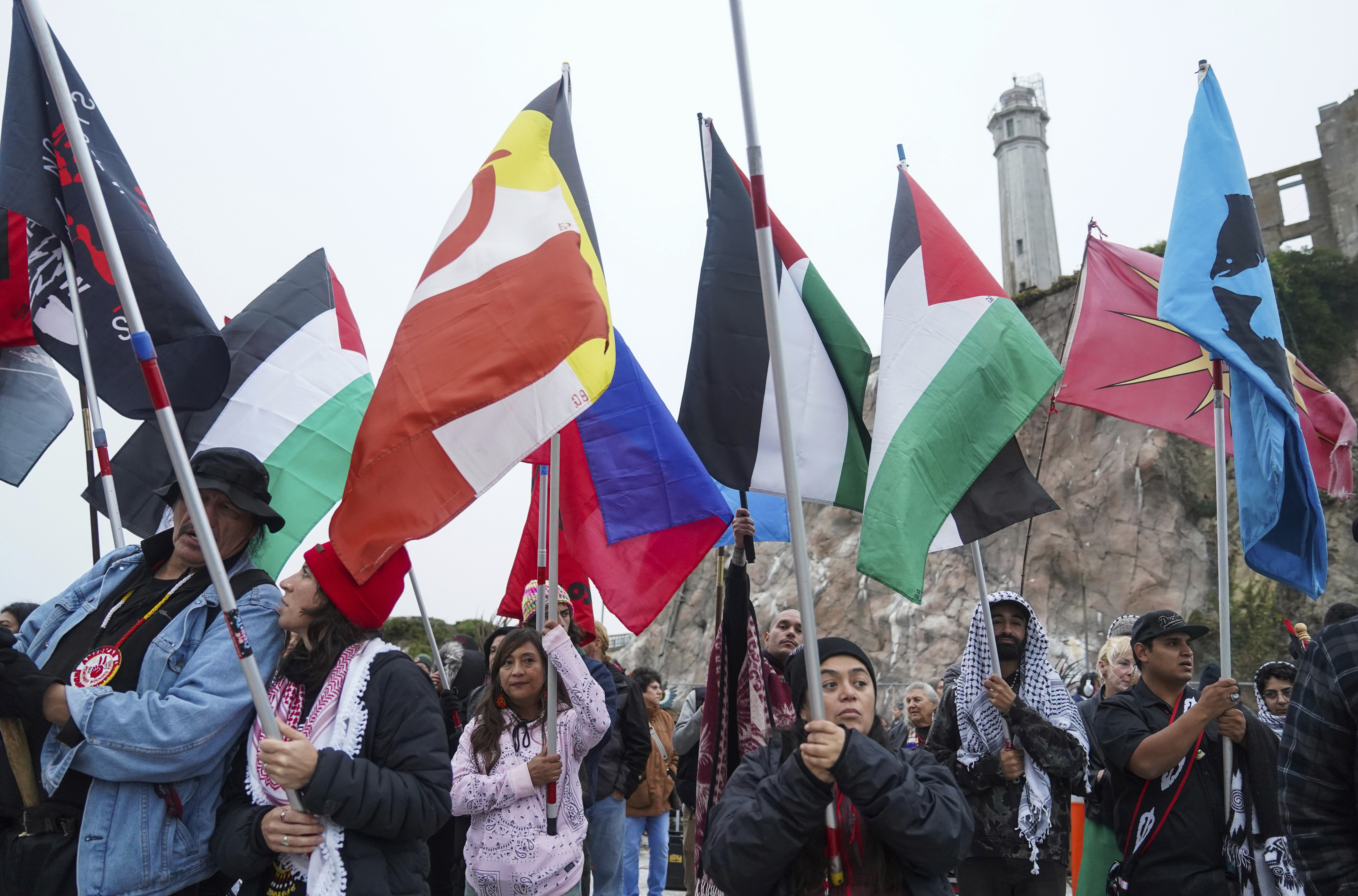 Flags representing different nations and tribes, American and abroad, are flown on Monday, Oct. 14, 2024, in San Francisco. (AP Photo/Minh Connors)