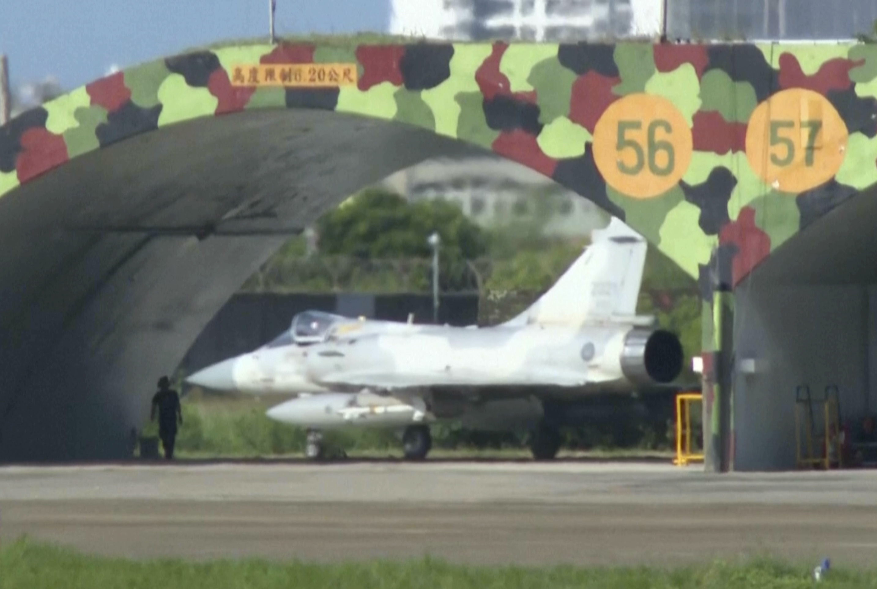 In this image taken from video, a Taiwanese air force French made Mirage-2000 fighter jet prepares for take off from the Hsinchu air base in Taiwan on Monday, Nov. 14, 2024. (AP Photo/Wu Taijing)