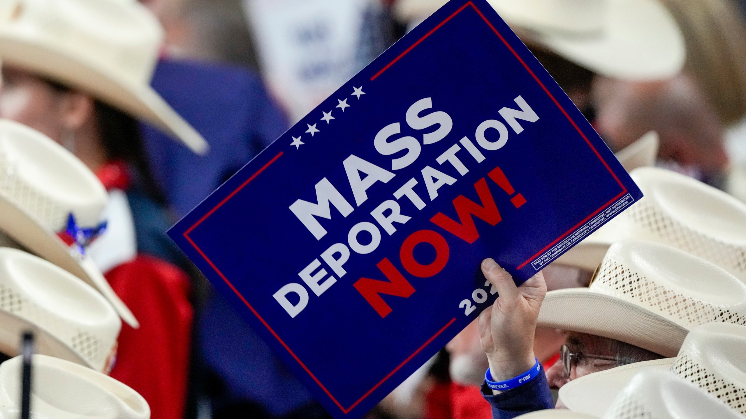 FILE - A member of the Texas delegation holds a sign during the Republican National Convention on July 17, 2024, in Milwaukee. (AP Photo/Matt Rourke, File)