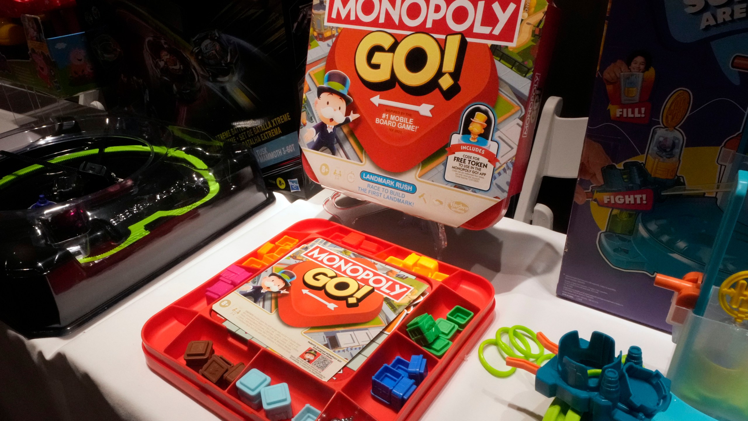 FILE - The Monopoly Go Board Game, from Hasbro, is displayed at the TTPM 2024 Holiday Showcase event, in New York, Sept. 17, 2024. (AP Photo/Richard Drew, File)