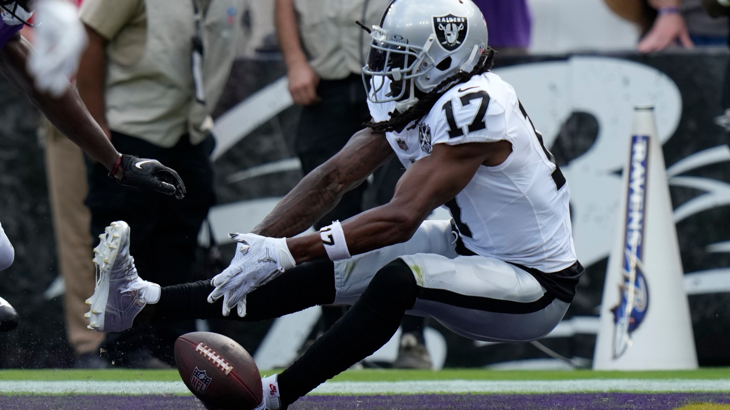 Las Vegas Raiders wide receiver Davante Adams (17) misses a catch attempt against the Baltimore Ravens during the second half of an NFL football game, Sunday, Sept. 15, 2024, in Baltimore. (AP Photo/Stephanie Scarbrough)