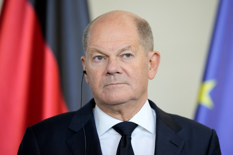 German chancellor Olaf Scholz listens to Ukraine's president Volodymyr Zelenskyy at the chancellery in Berlin, Germany, Friday, Oct. 11, 2024. (AP Photo/Ebrahim Noroozi)