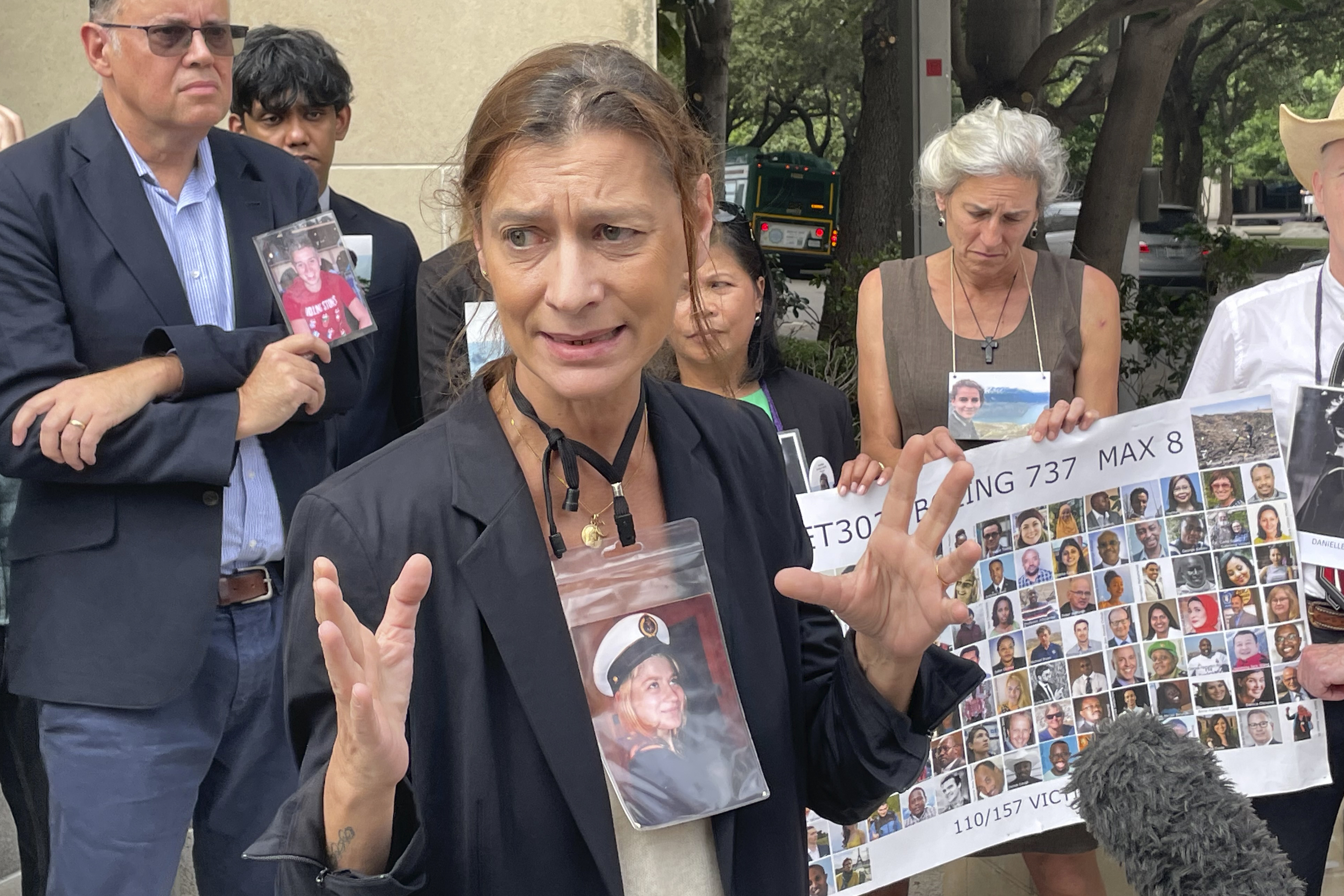 Catherine Berthet, whose daughter Camille Geoffrey died in the March, 2019, crash of an Ethiopian Airlines 737 Max, speaks outside federal court in Fort Worth, Texas, on Friday, Oct. 11, 2024. Lawyers are asking a federal judge to throw out a plea agreement that the aircraft manufacturer Boeing struck with federal prosecutors. (AP Photo/Dave Koenig)